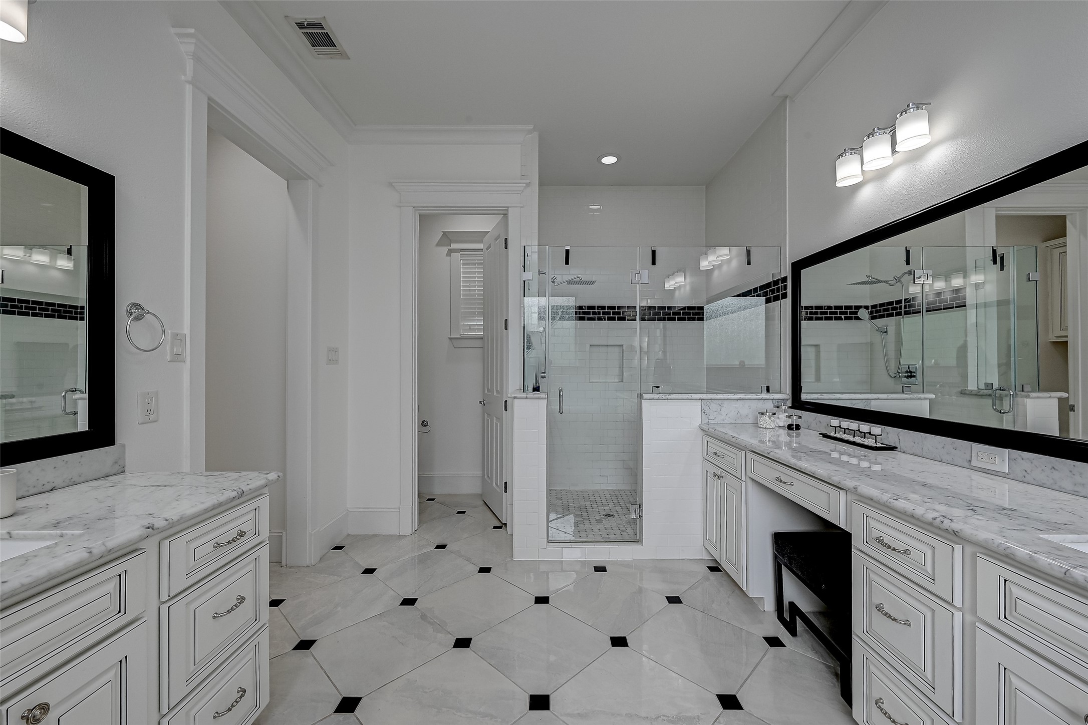 A separate shower, adorned with intricate details, promises a revitalizing experience. The flooring, a masterpiece of design, elevates the ambiance with its stunning visual appeal.