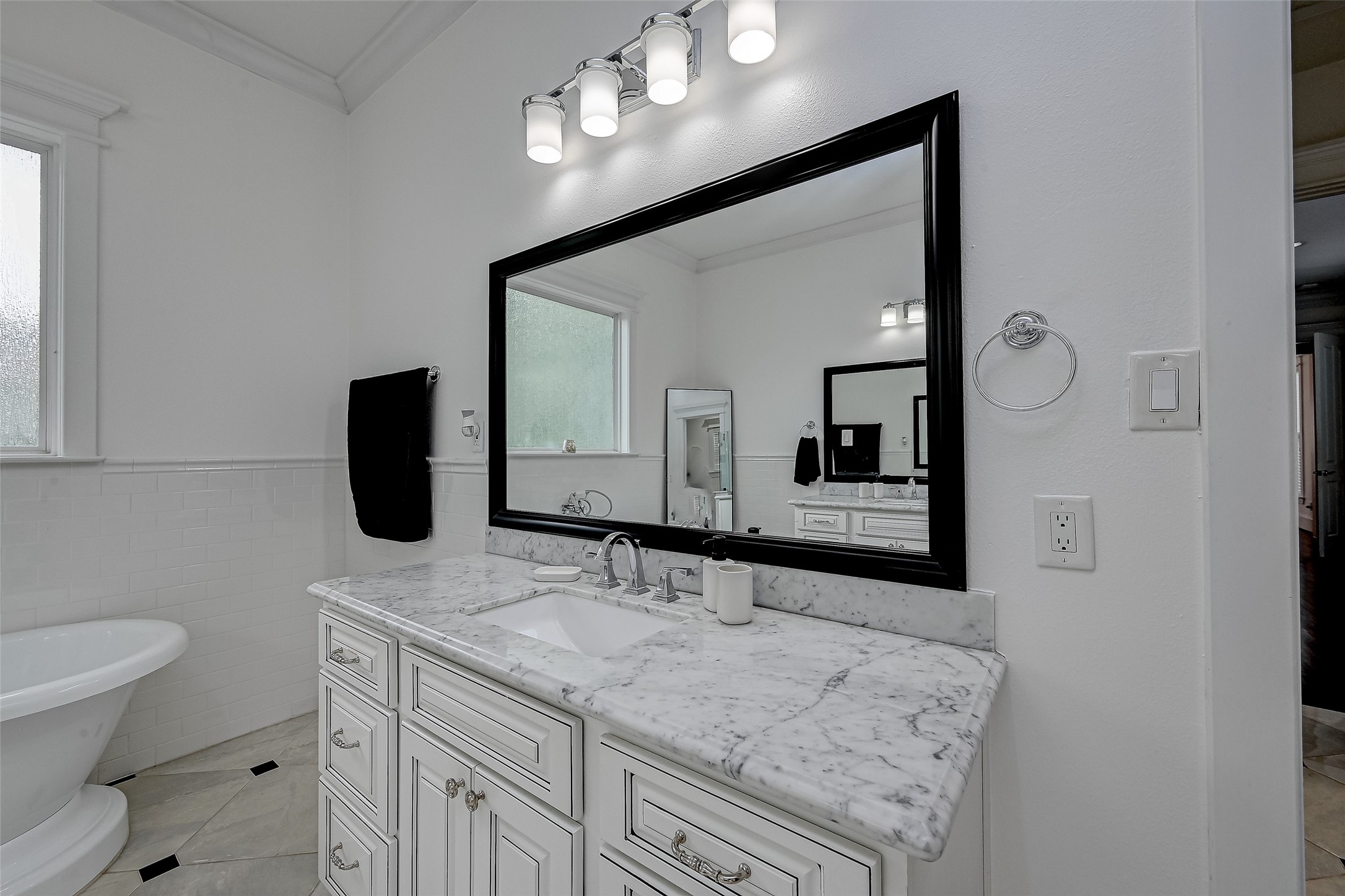 The dual vanities are both functional and stunning.