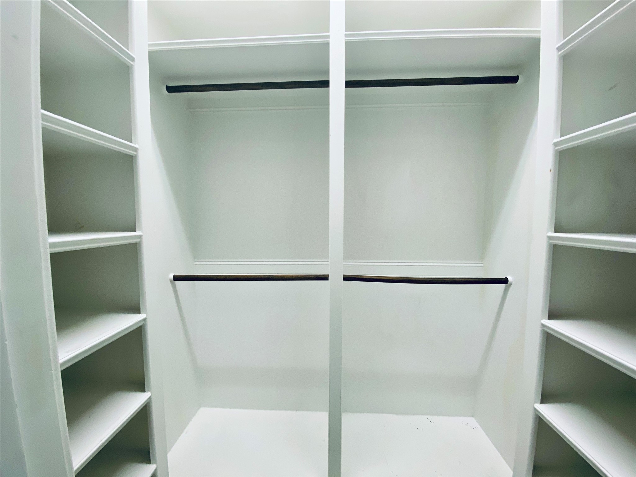The second walk-in closet offers ample space for all your storage needs.