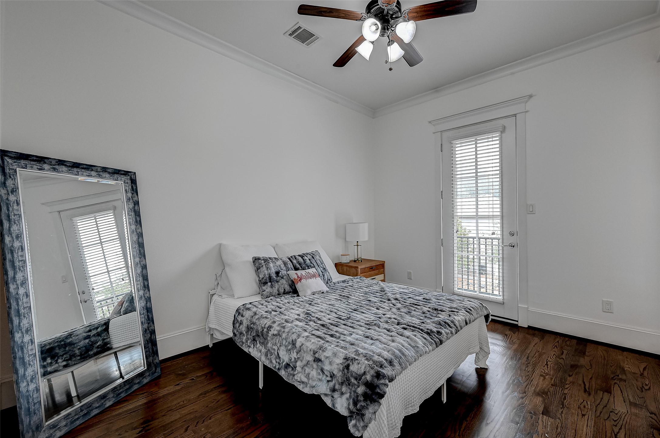 The secondary bedroom, gracing the front of the property, offers a tranquil escape with balcony access, where one can savor the surroundings. Completing the allure, a spacious walk-in closet stands ready to accommodate all your storage needs.