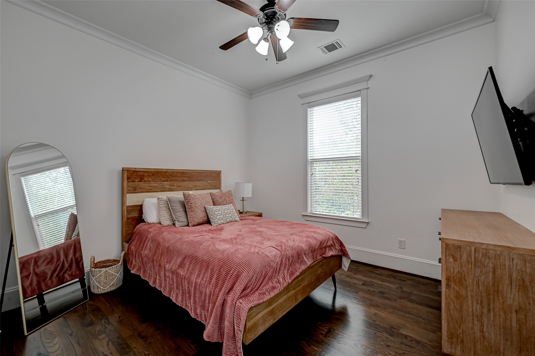 The secondary bedroom is a cozy haven, complete with a nice walk-in closet that ensures both comfort and organization for its lucky inhabitant.