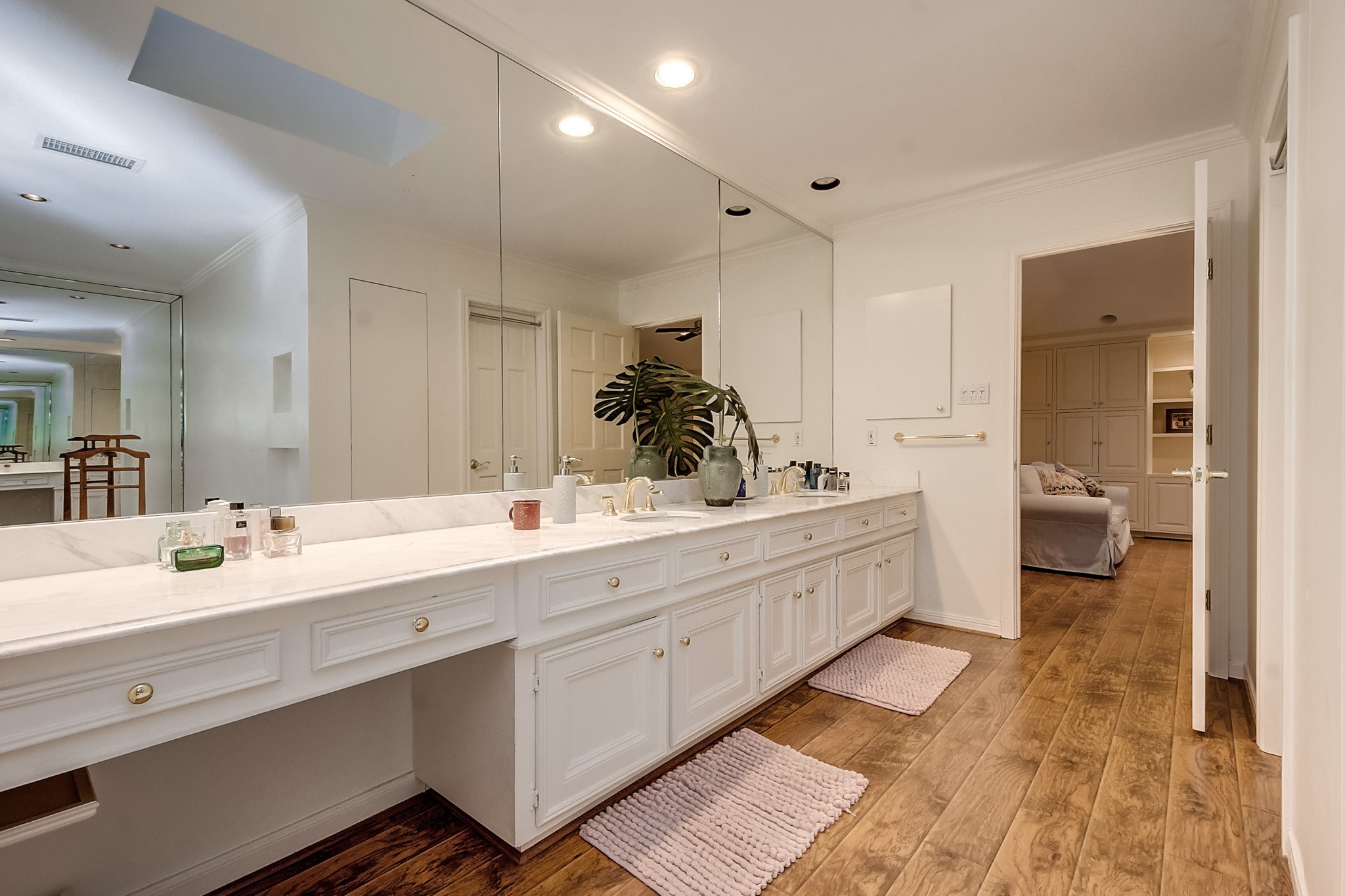 Master Bath has LONG marble counter top with two sinks, two walk-in closets and room for an exercise nook.