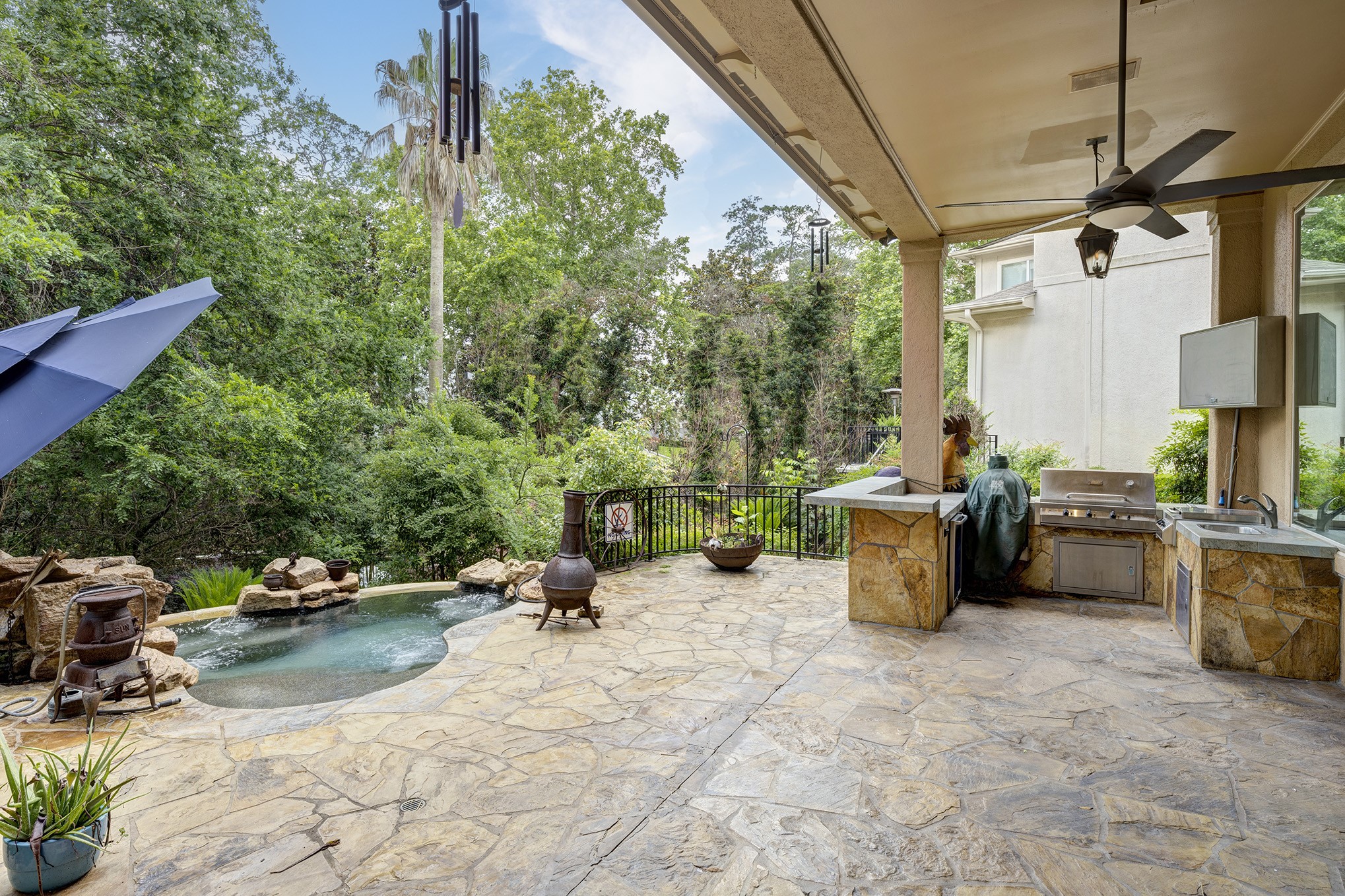 Backyard oasis with plunge pool / spa and outdoor kitchen.