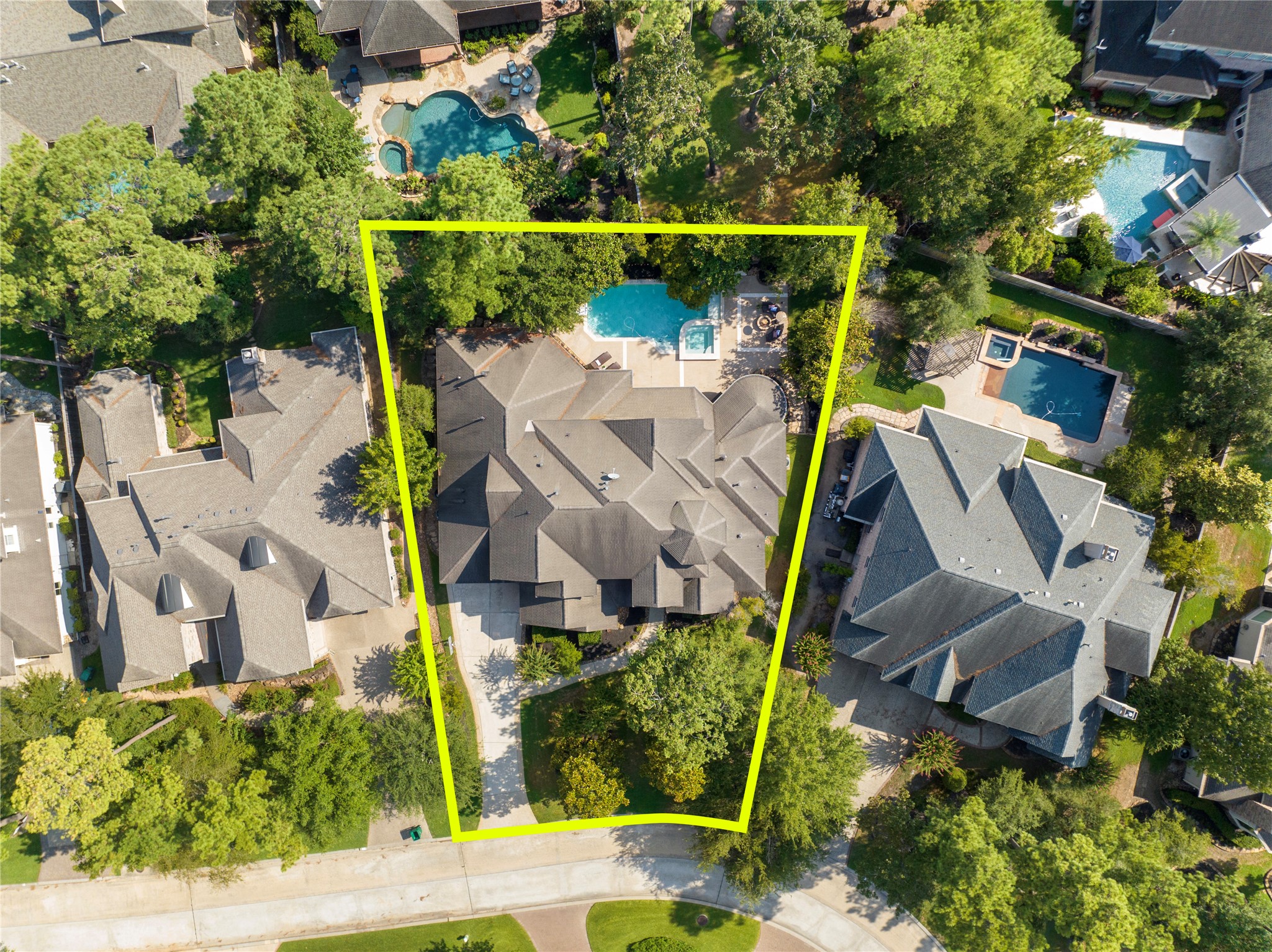 An aerial view of the home and picture-perfect backyard. The home does have newly replaced and serviced HVAC components (2017 - 2021), new hot water heater (July 2023) and gutters around the entire home.