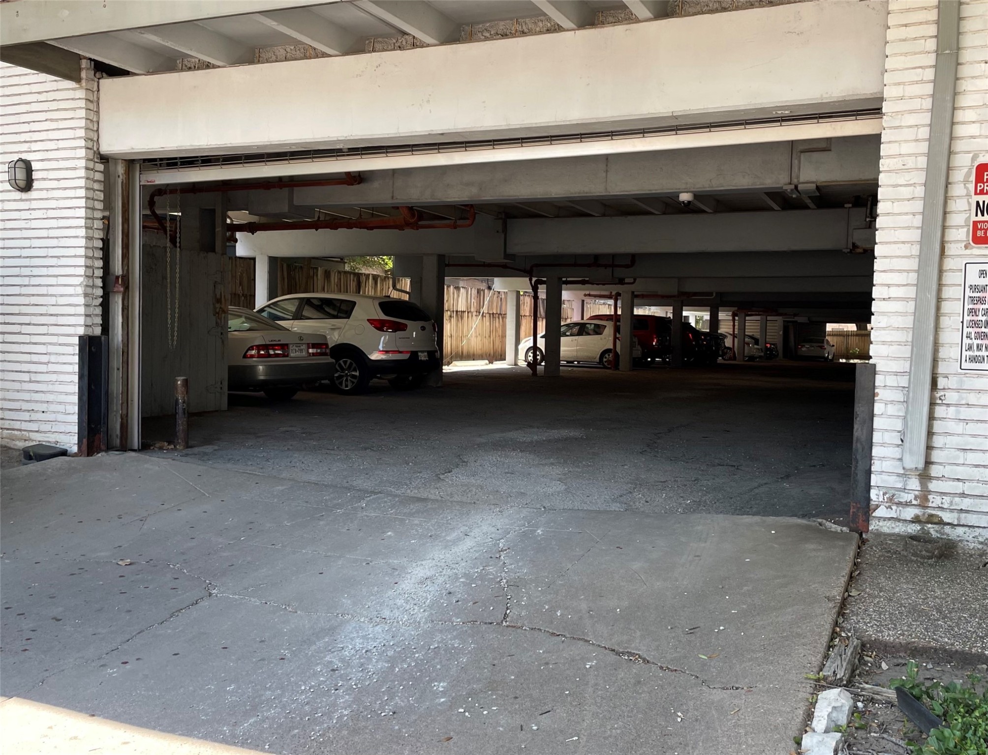 This condo has one assigned space in the garage.