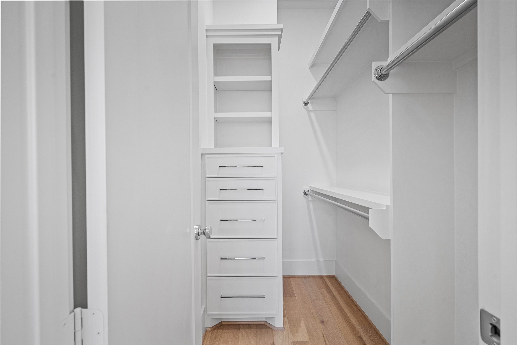 Storage is in abundance throughout the house, here is the walk-in closet for the secondary bedroom pictured before.