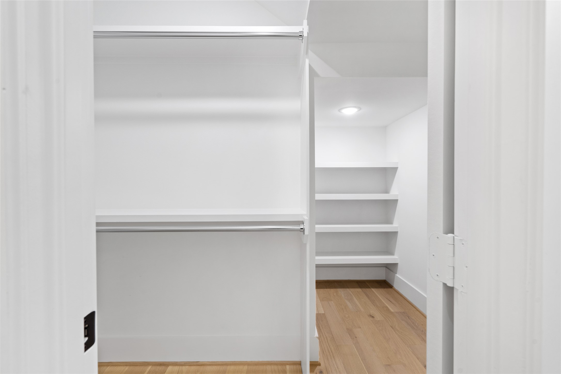 Amazing storage for both the bedroom and overflow underneath the stairs, which wraps around the corner on the right.