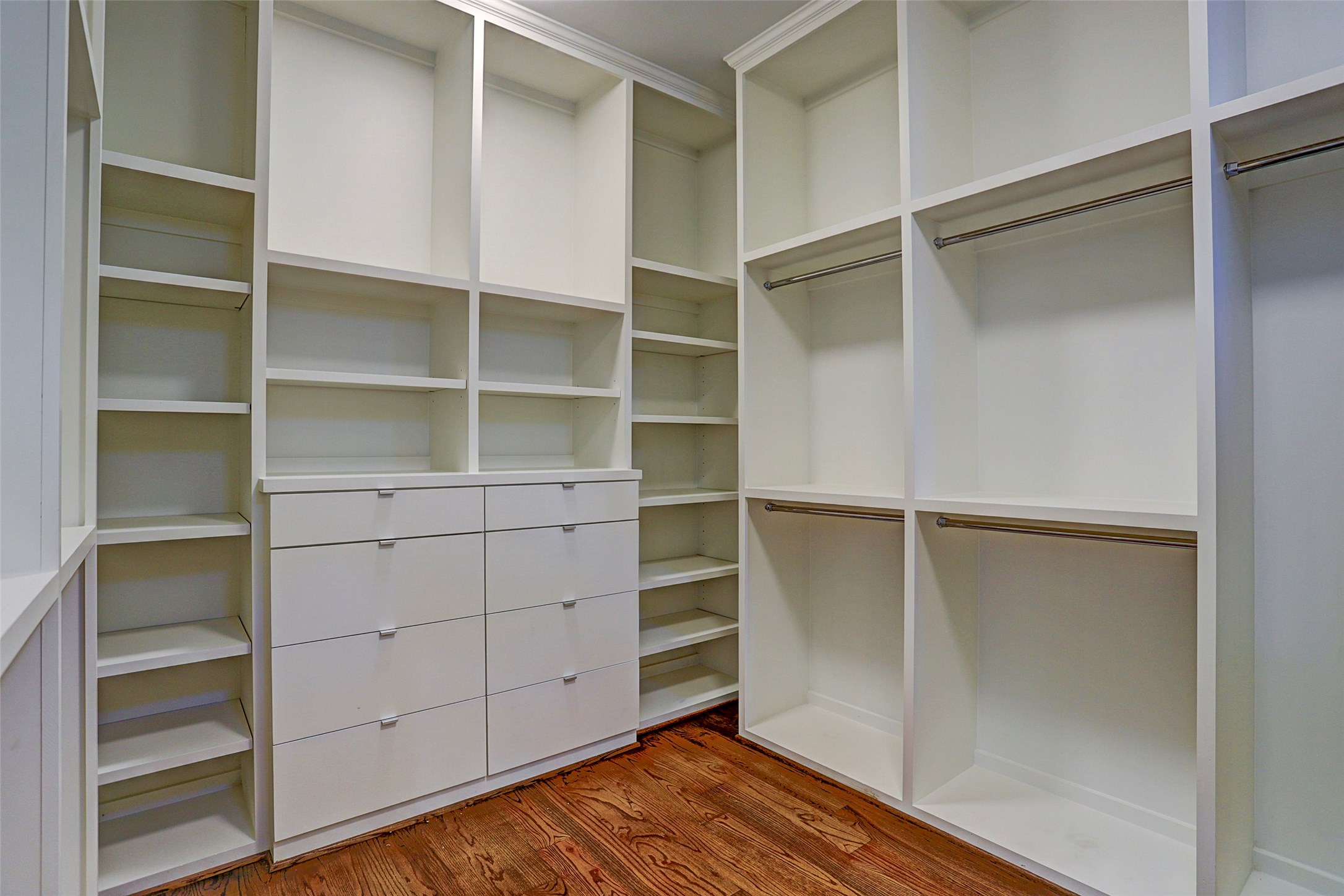 Master closet with built-in drawers, show racks & pull-down racks for closet
