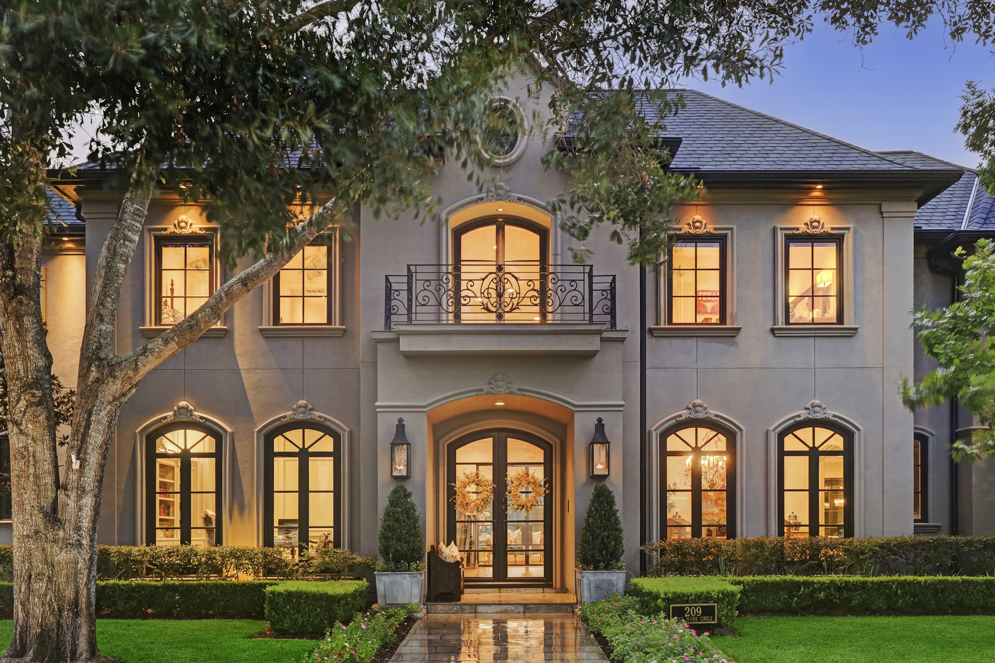 The symmetrical designed elevation and beautifully manicured grounds boasts an impressive curb appeal.