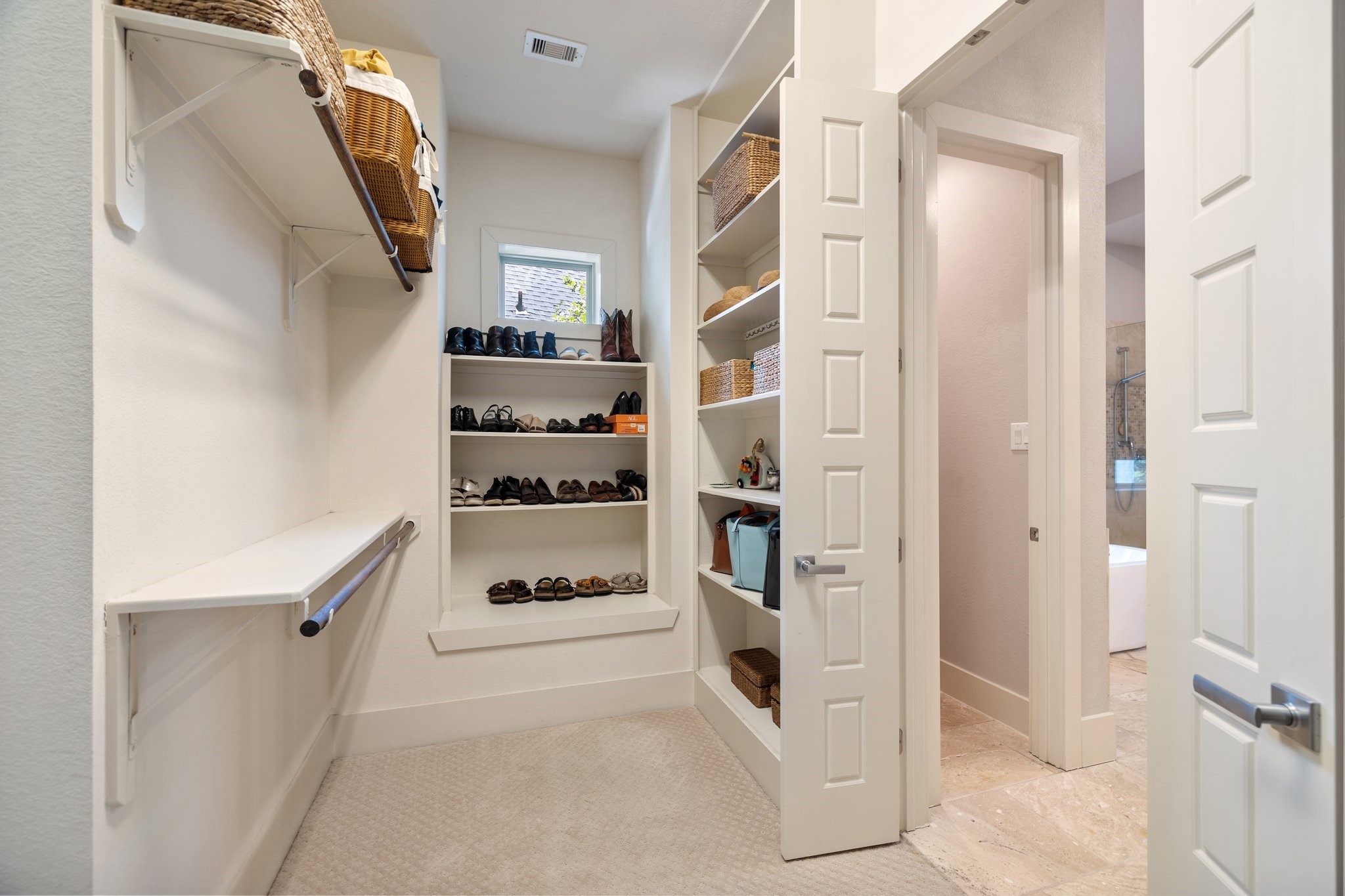 Expansive walk in closet for the primary suite, his/her layout for separation.