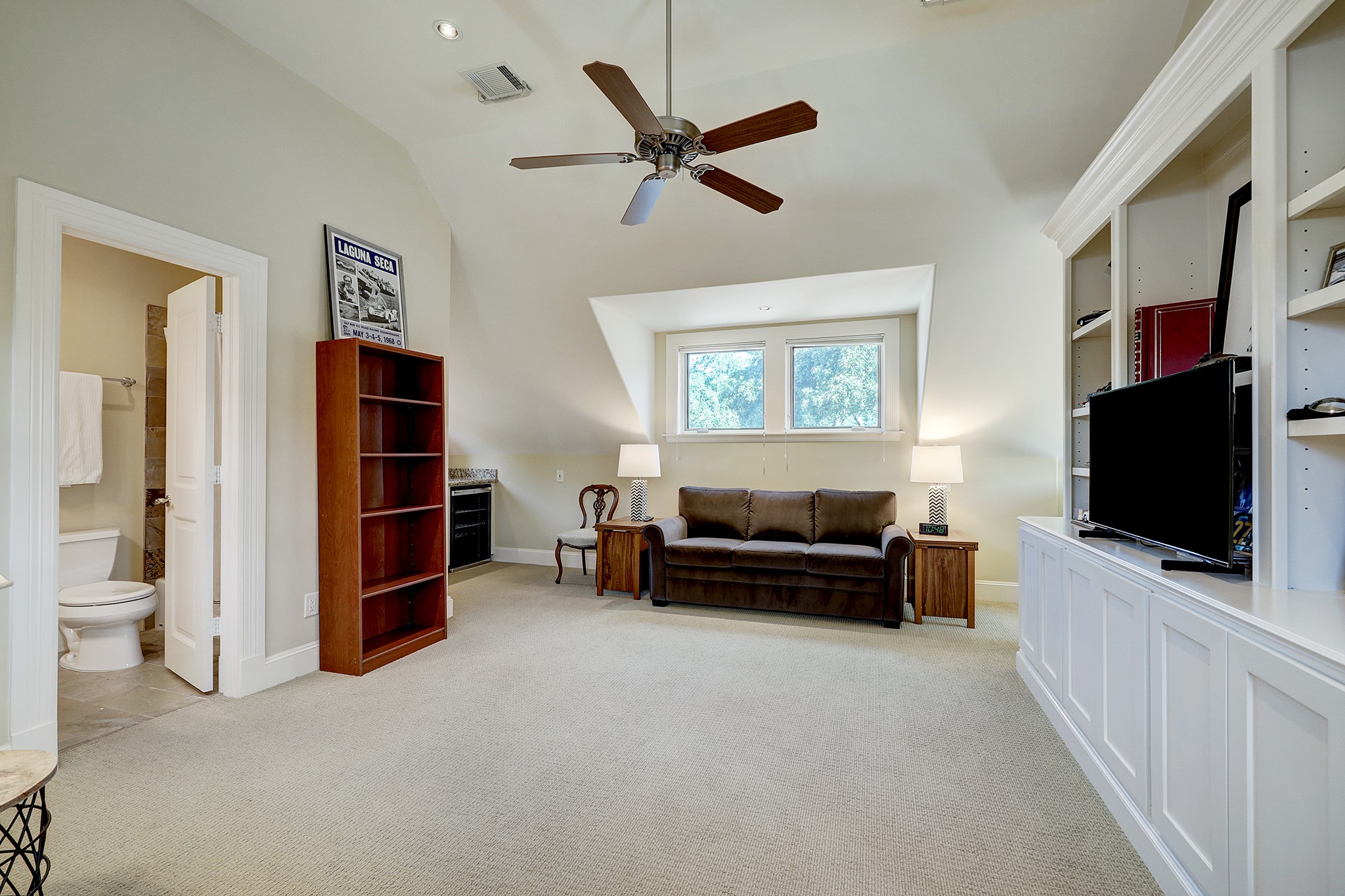 Game Room with 10' ceiling, full bath, and walk-in closet could easily be a fourth bedroom!