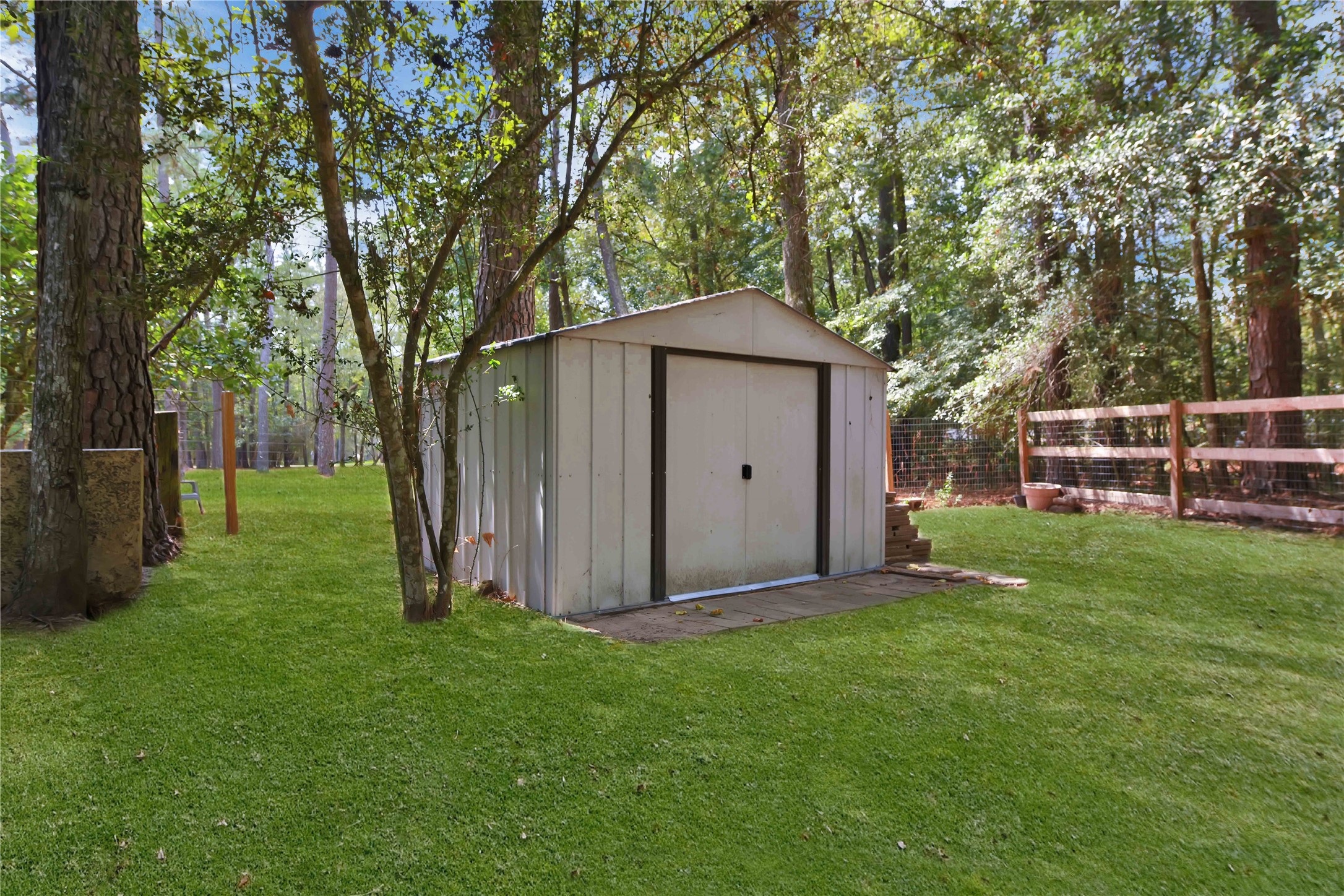 16603 Surrey Ln- A shed comes with the property for more storage.
