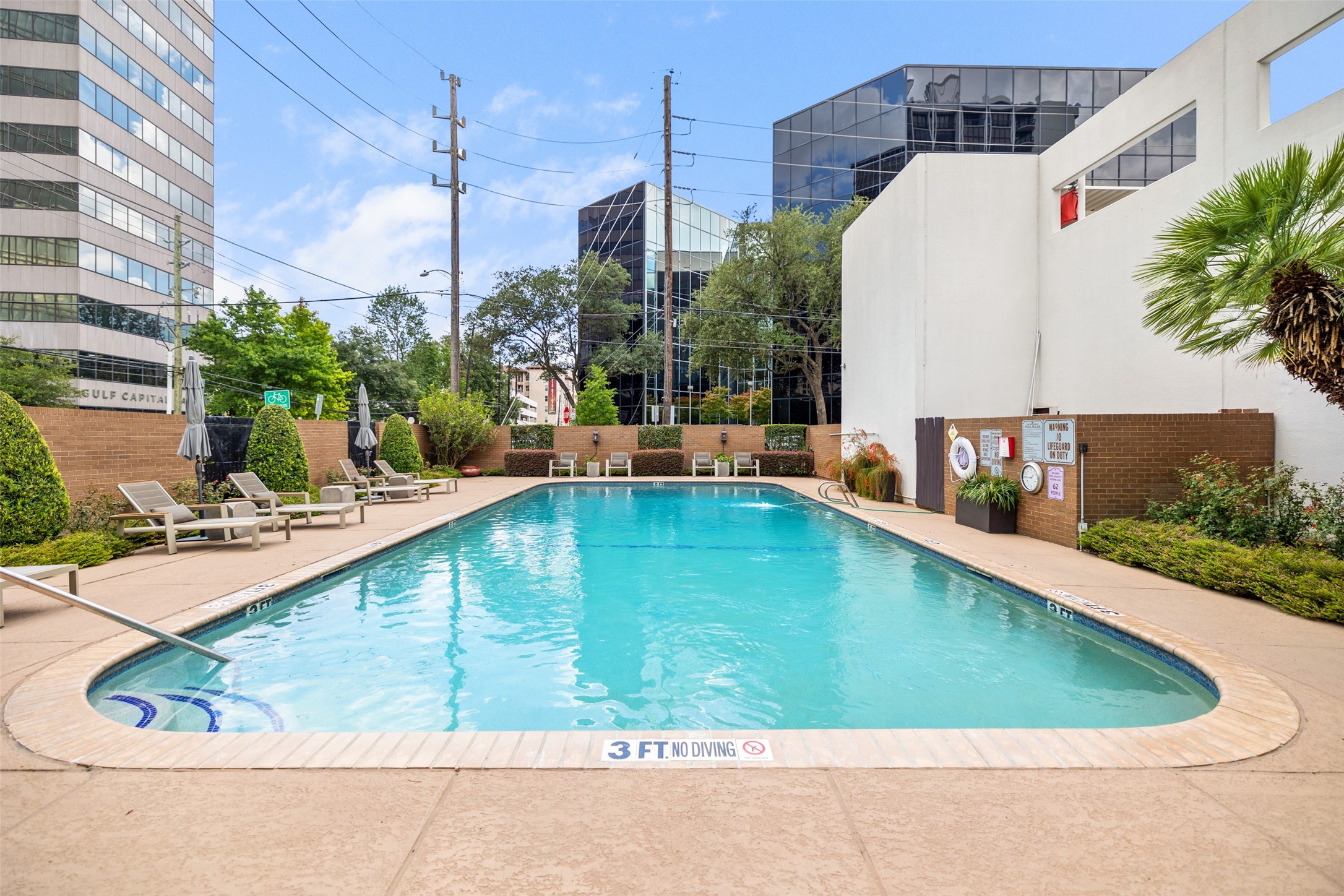 Fully fenced resident pool with custom landscaping provides great privacy and relaxation.