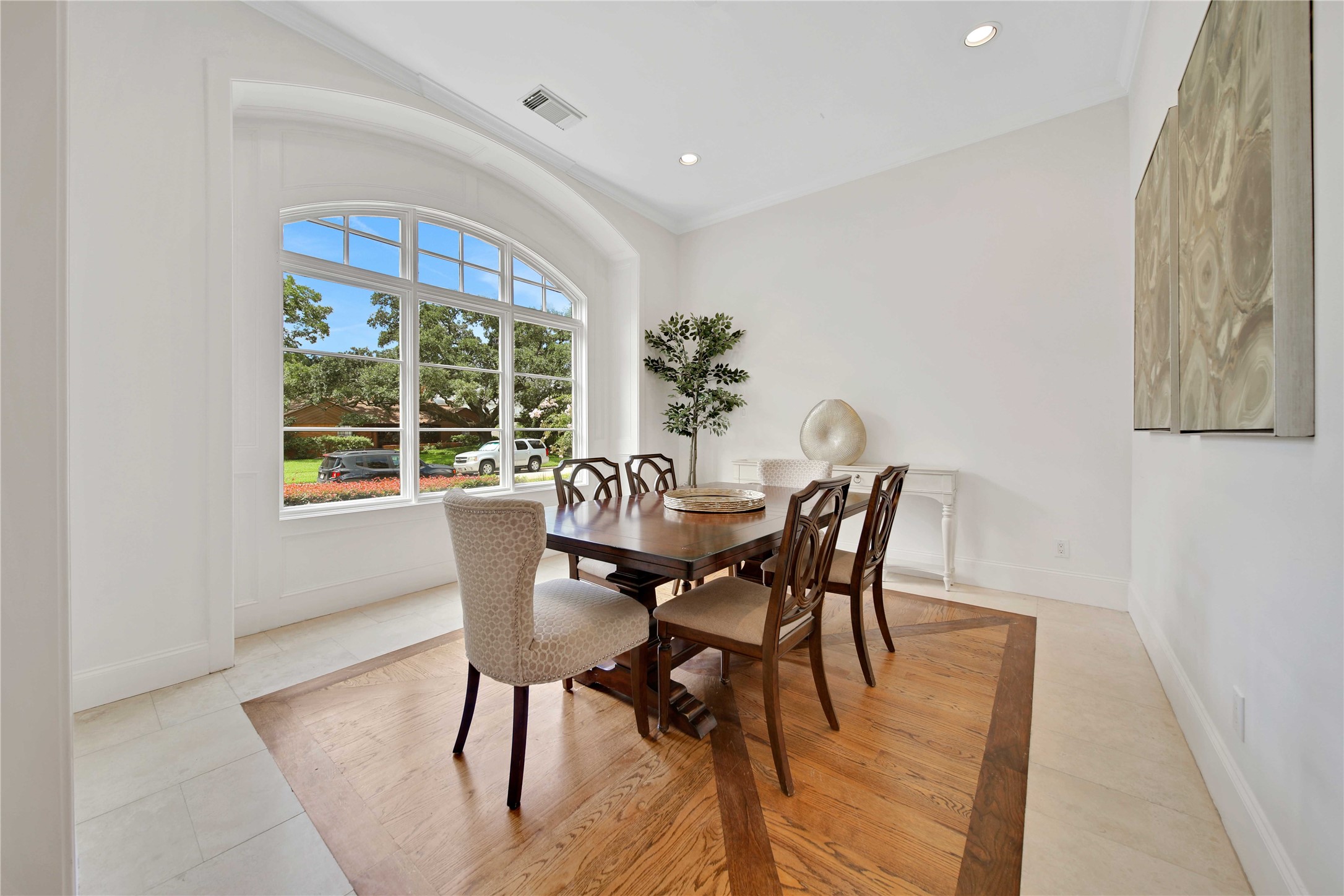 Step into luxury and elegance with the formal dining room and living room of this remarkable home.
