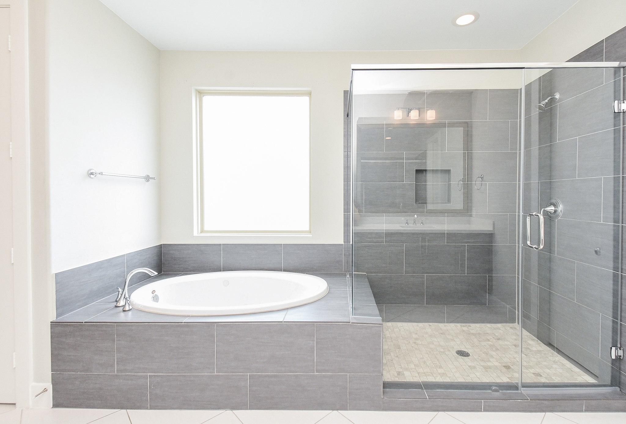Your primary ensuite bath is just beyond the double doors, left.