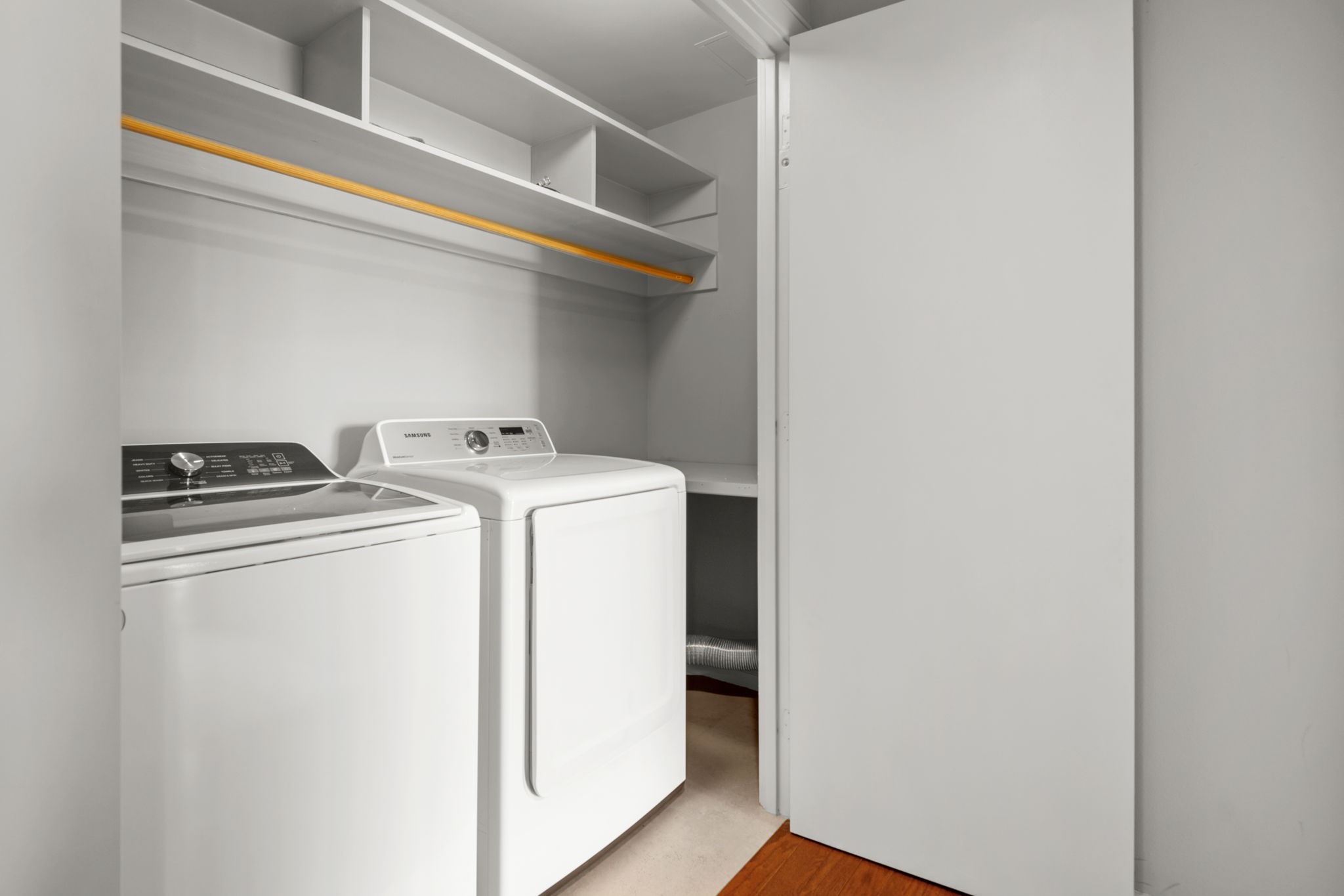 7x3 Utility - 
 Full-size washer and dryer come with the unit. Note that there are shelves and hanging rod to make this chore easier.