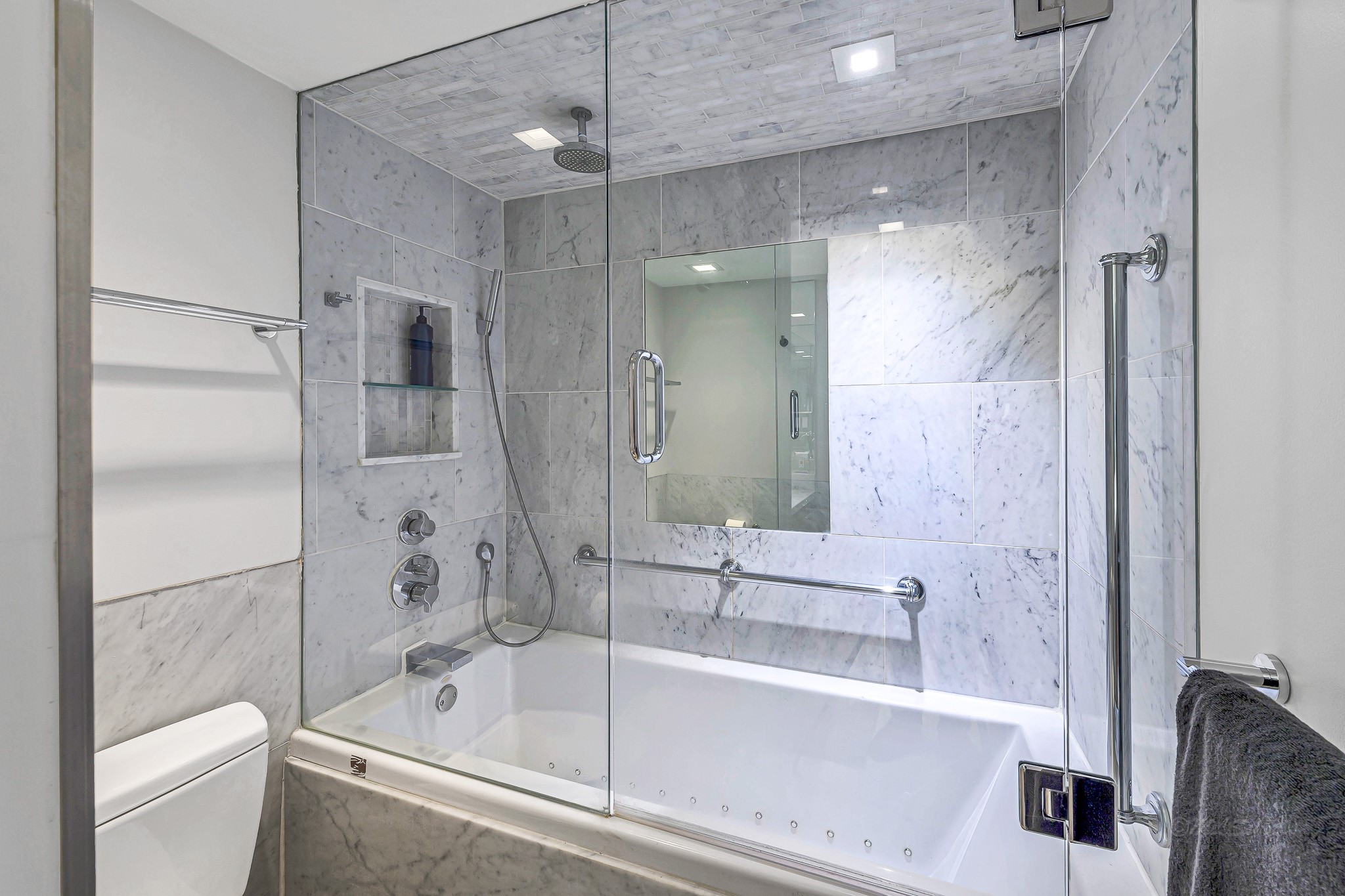 Shower/tub combo with rain shower feature and jetted tub