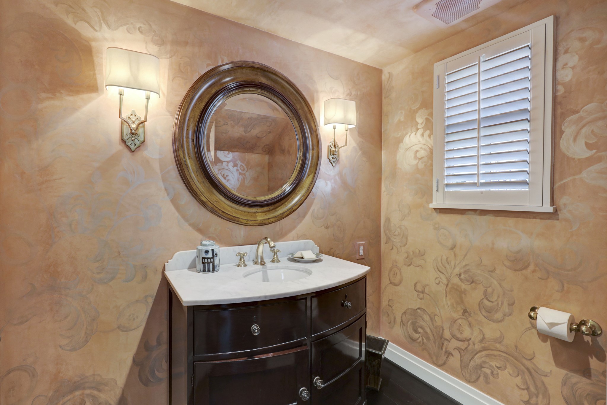 Powder Room with Segreto finishes, well located just off foyer.