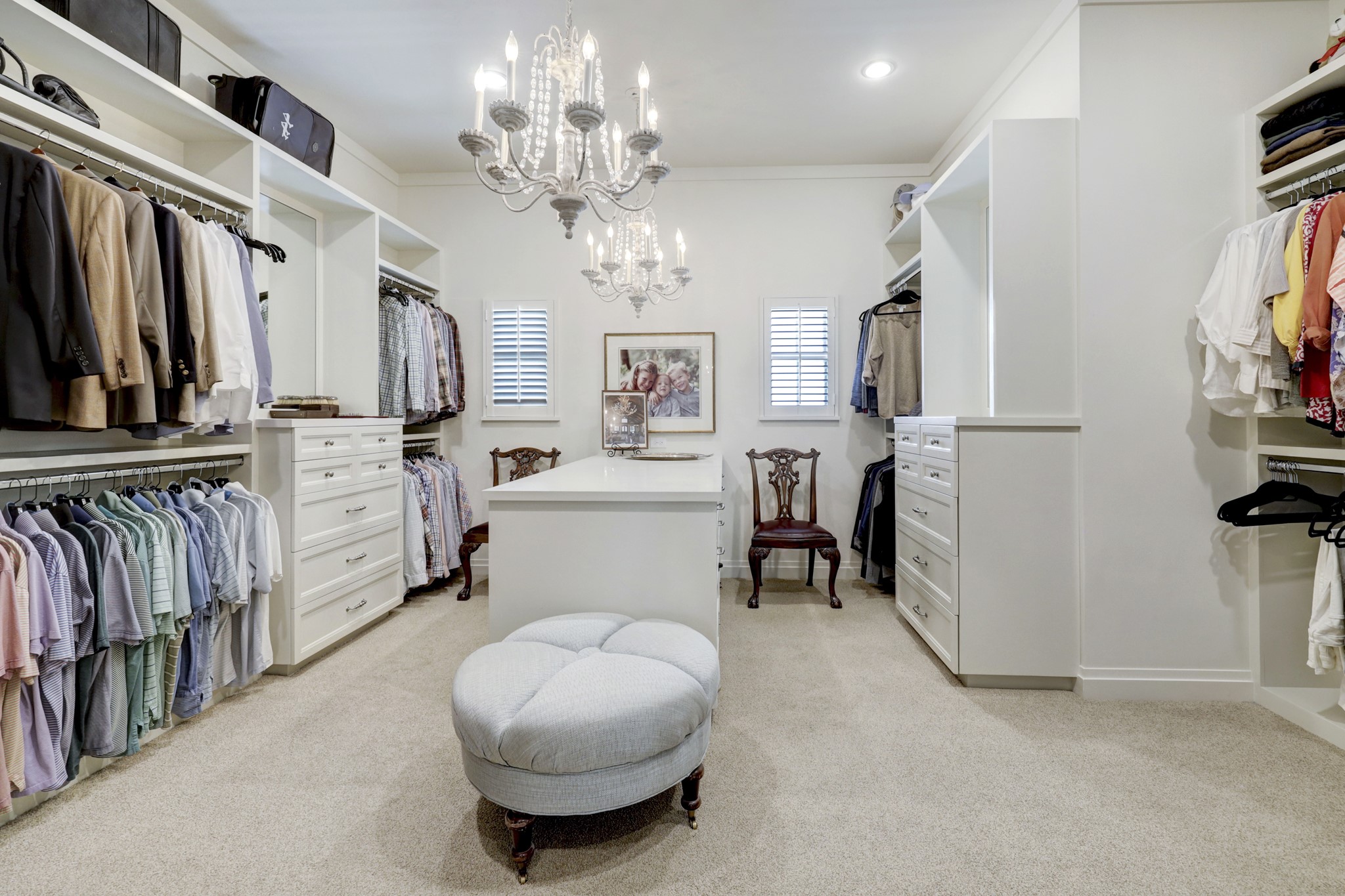 Incredible Primary Closet with built ins and packing station. This home has exceptional storage throughout.