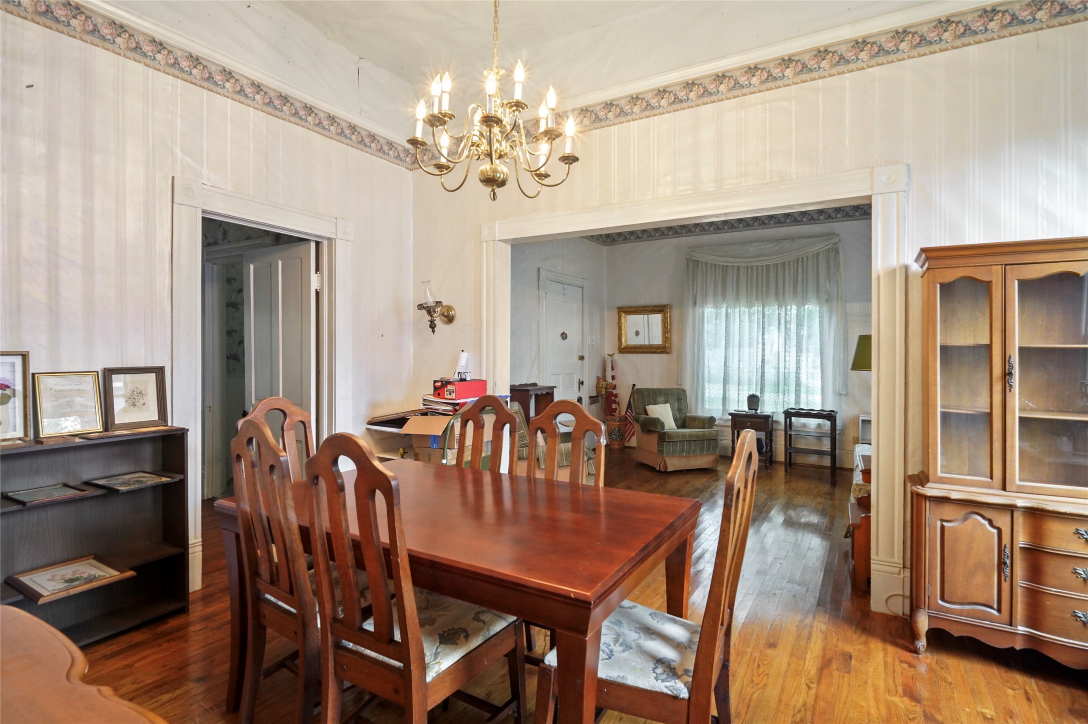 Formal dining area - open to living room - check out the nice wood floors.