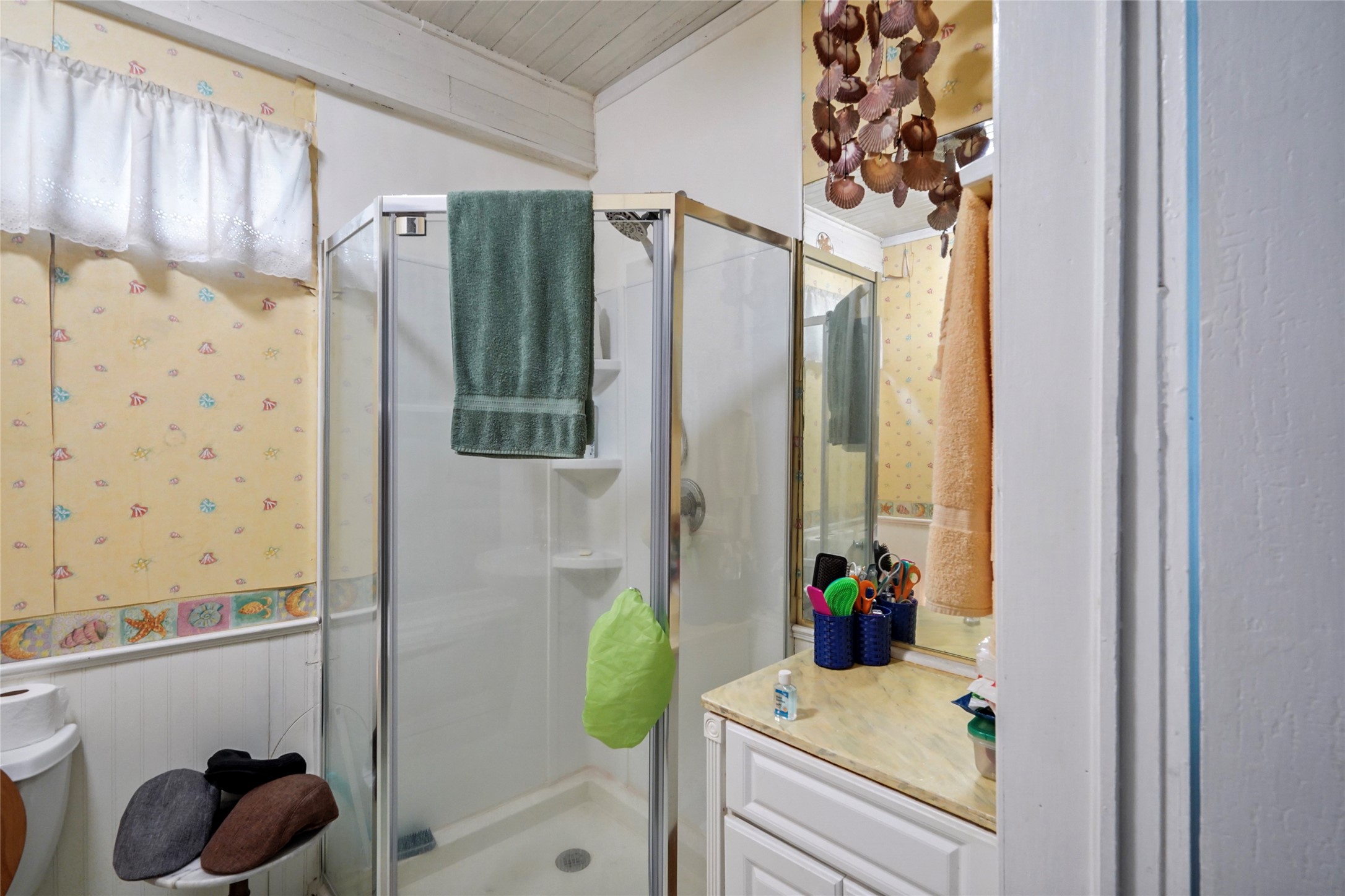 Primary bath with adjoining dressing area.