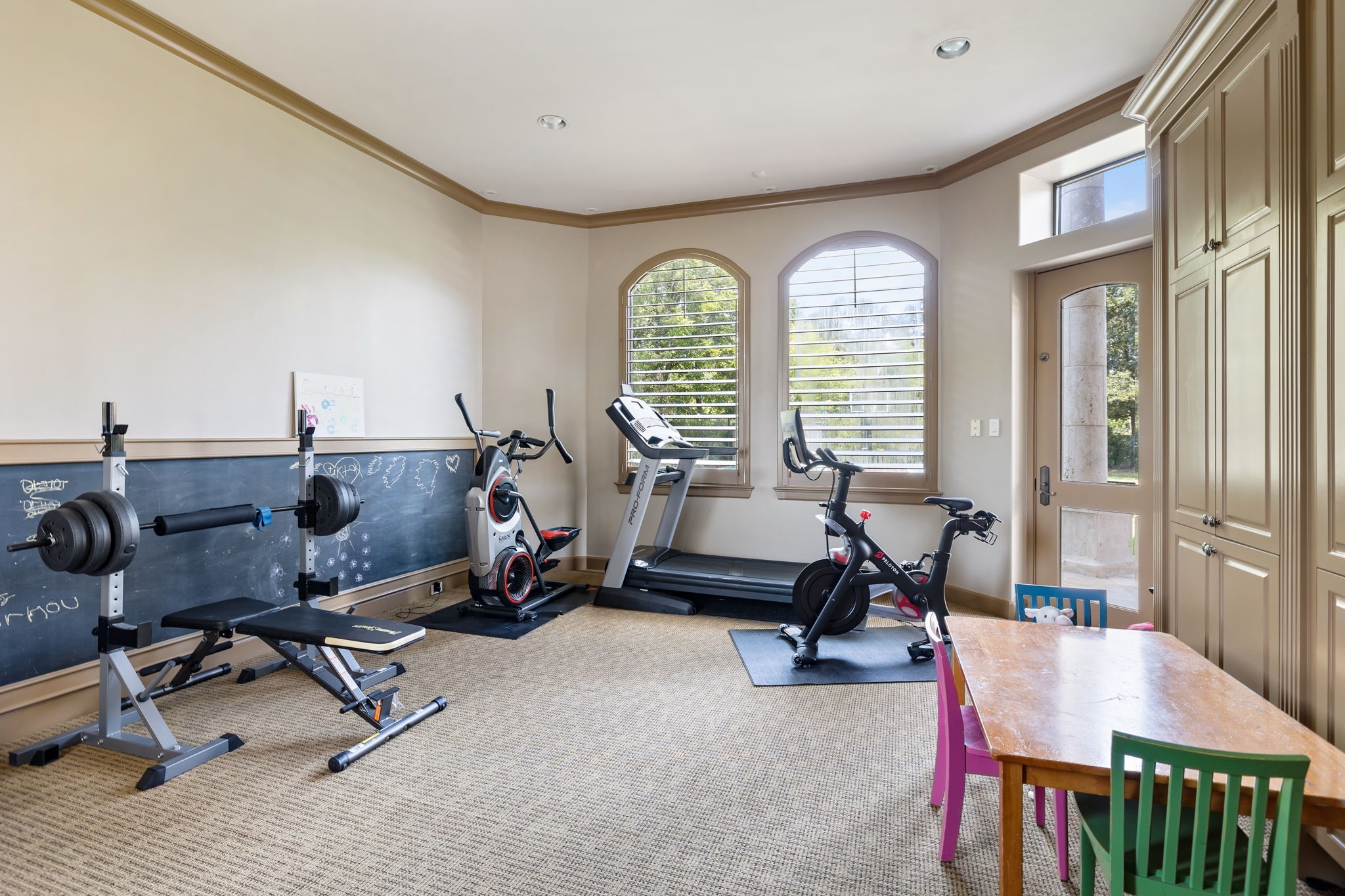 Completing the First Floor is an Exercise Room with an ensuite Bathroom and walk-in Closet. Once you have gotten buff enough, the door leads to the Pool for basking or lapping. An en-suite Bath can also function as your Pool Bath. The Exercise Room may be adapted as an additional Secondary Bedroom