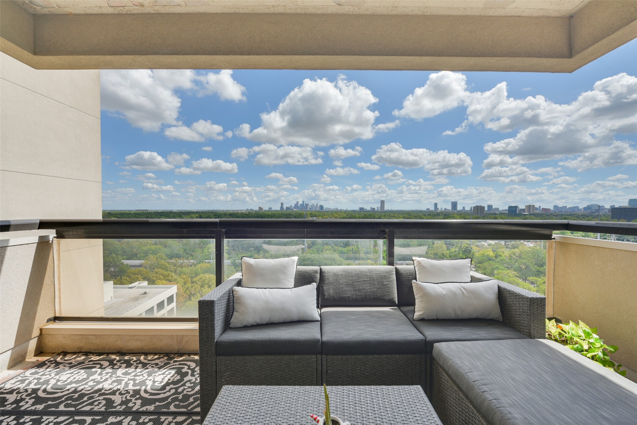 One of two 16th floor balconies with ample space for seating and treetop views of Memorial Park and downtown.