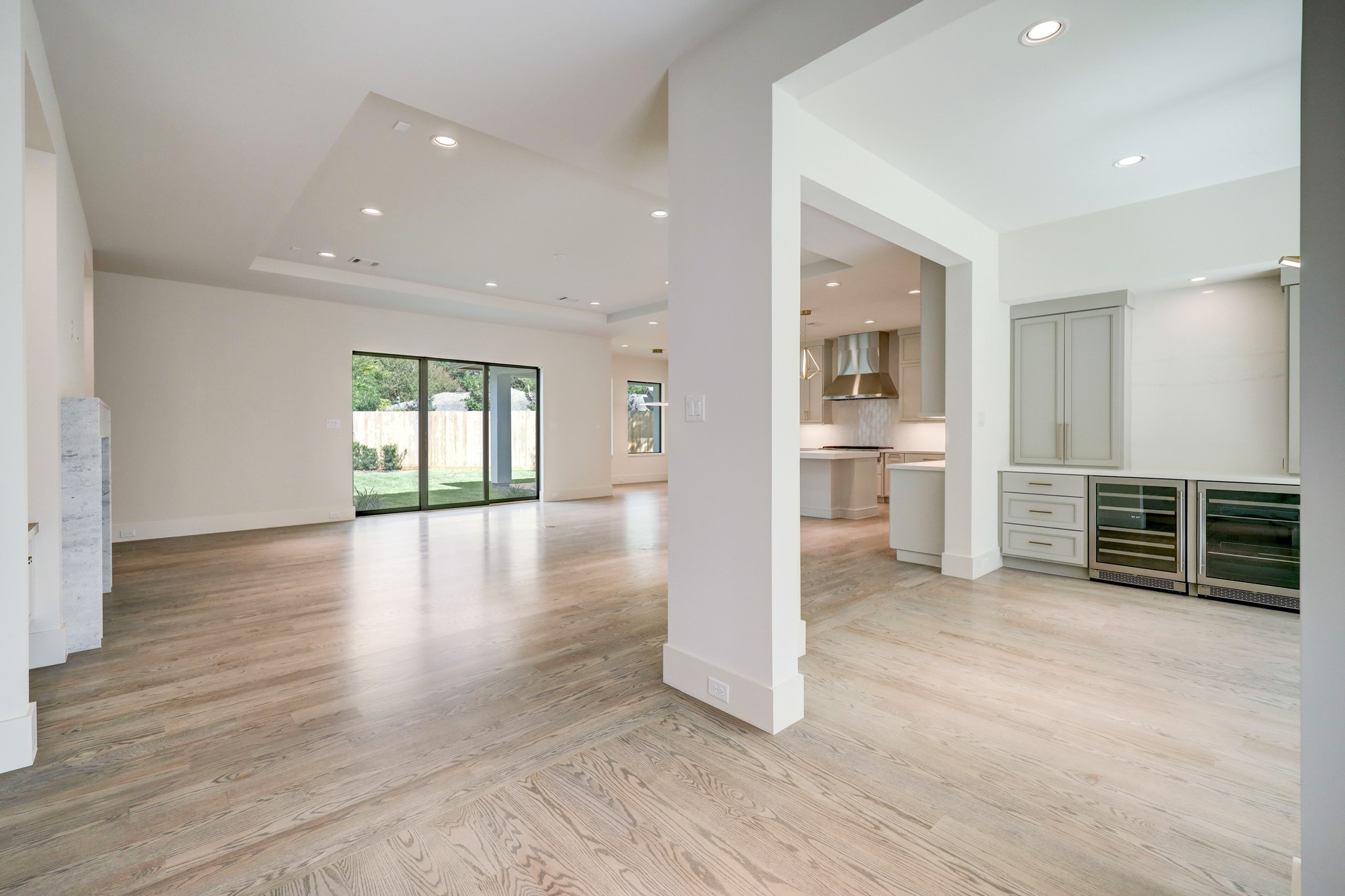 Solid wood flooring throughout the home except in the bathrooms and laundry room.