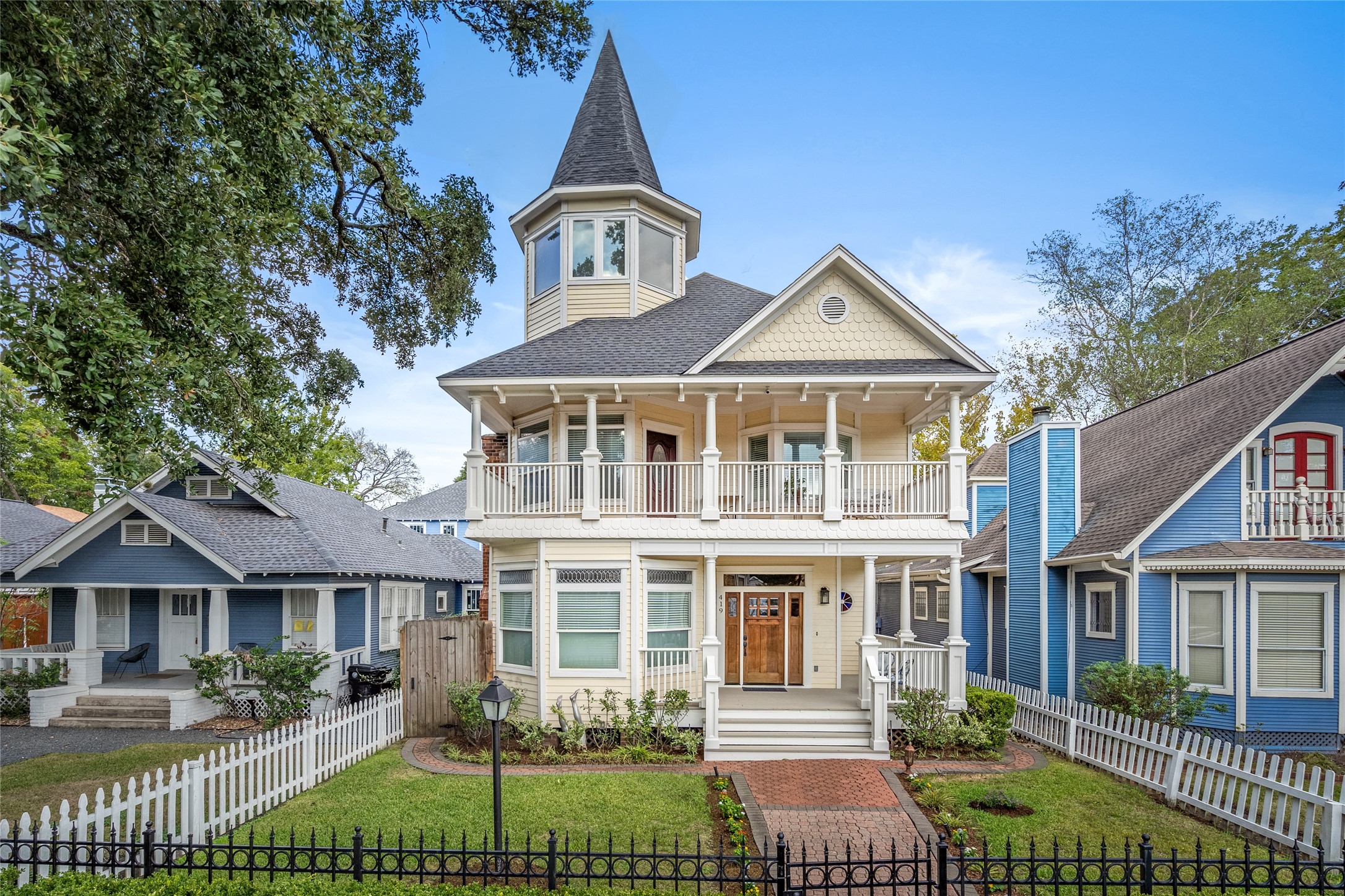 Charming two story was renovated and designed for todays lifestyle.  Wrought iron front fencing, paver sidewalk to the wrap around front porch. Wonderful curb appeal!