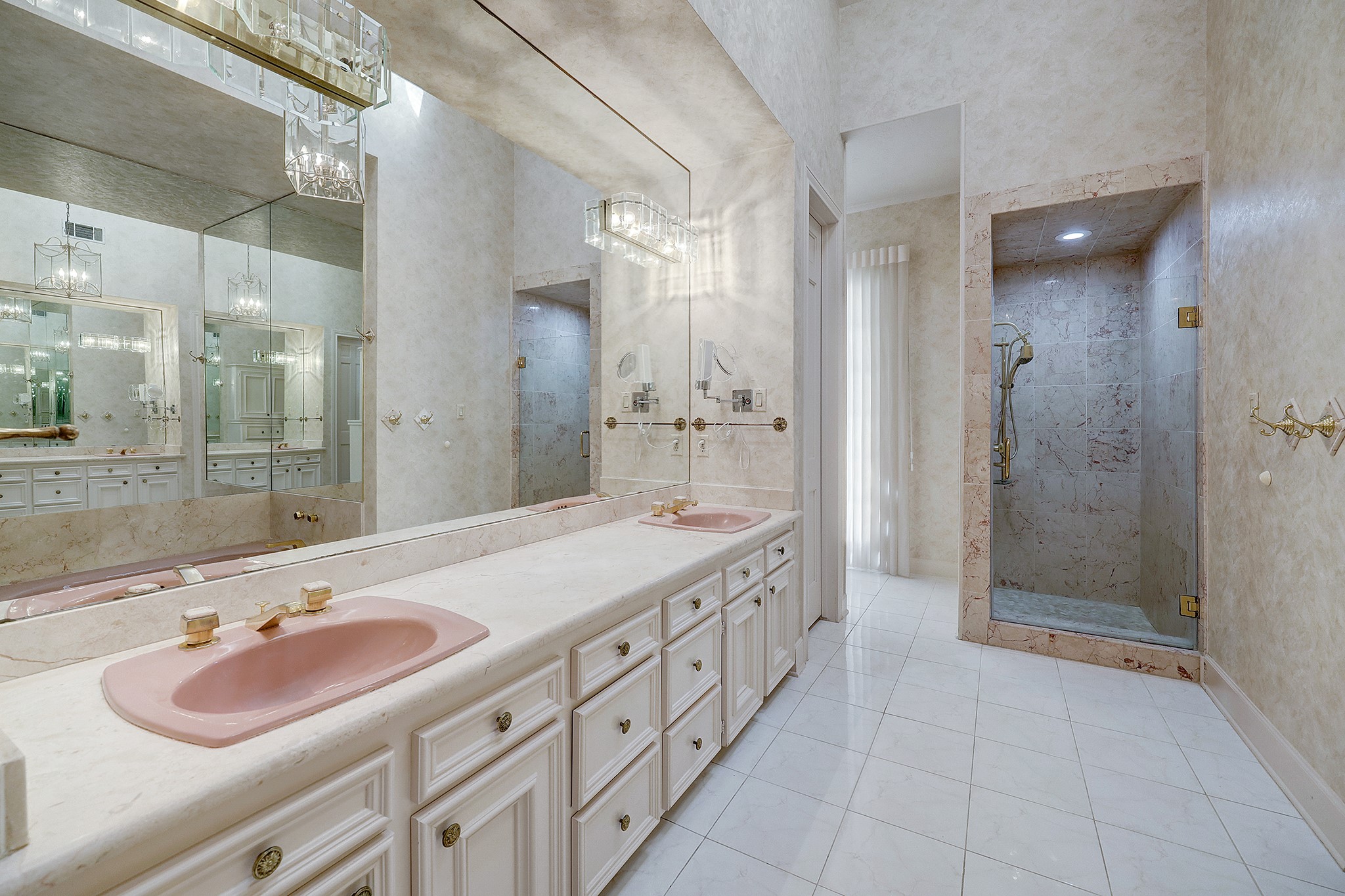 Primary bath with dual sinks, dual closets and shower and separate tub