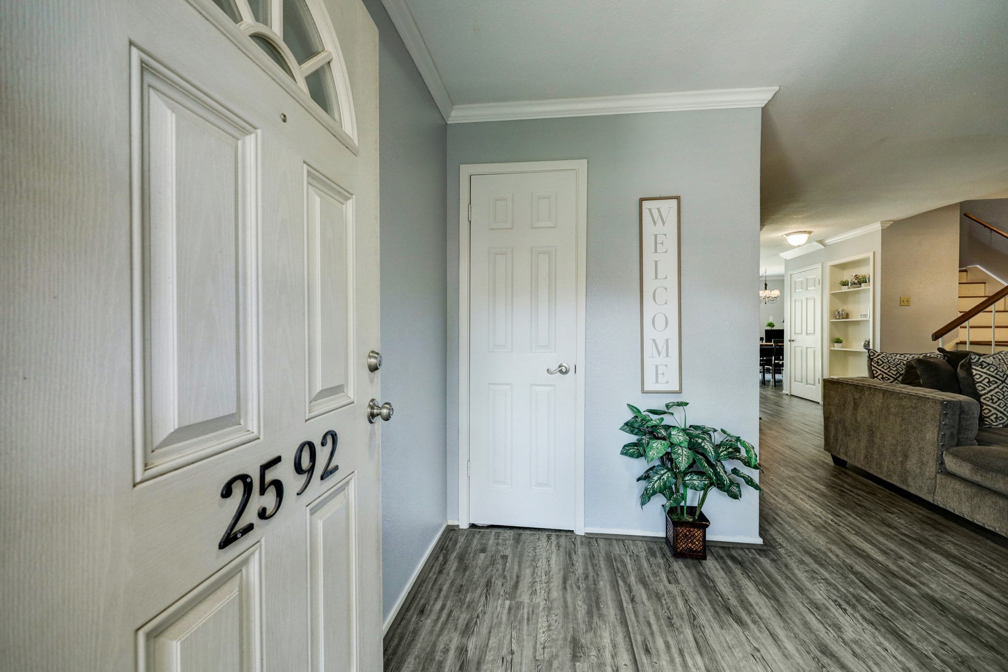 Step through the front door and into the large living room. Notice the conveniently located storage closet.