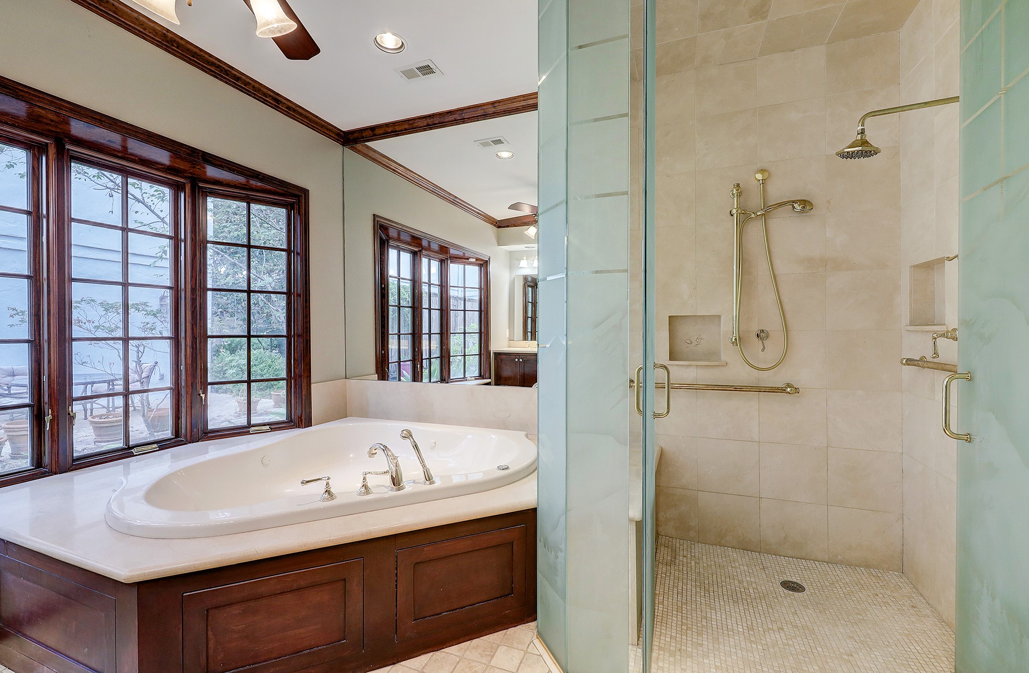 Primary Bathroom with Jacuzzi Tub and Separate Shower.