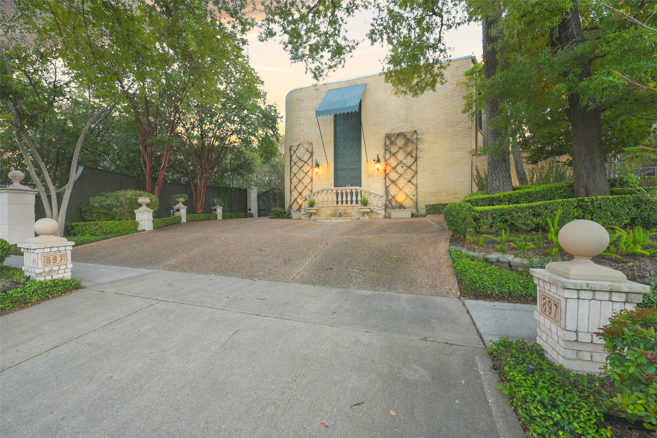 Lucian Hood designed patio home offers a lock and leave environment inside the prestigious River Oaks neighborhood. The driveway gate to the east of the home goes through to a three car garage and accesses the alley way for seamless ingres and egress.