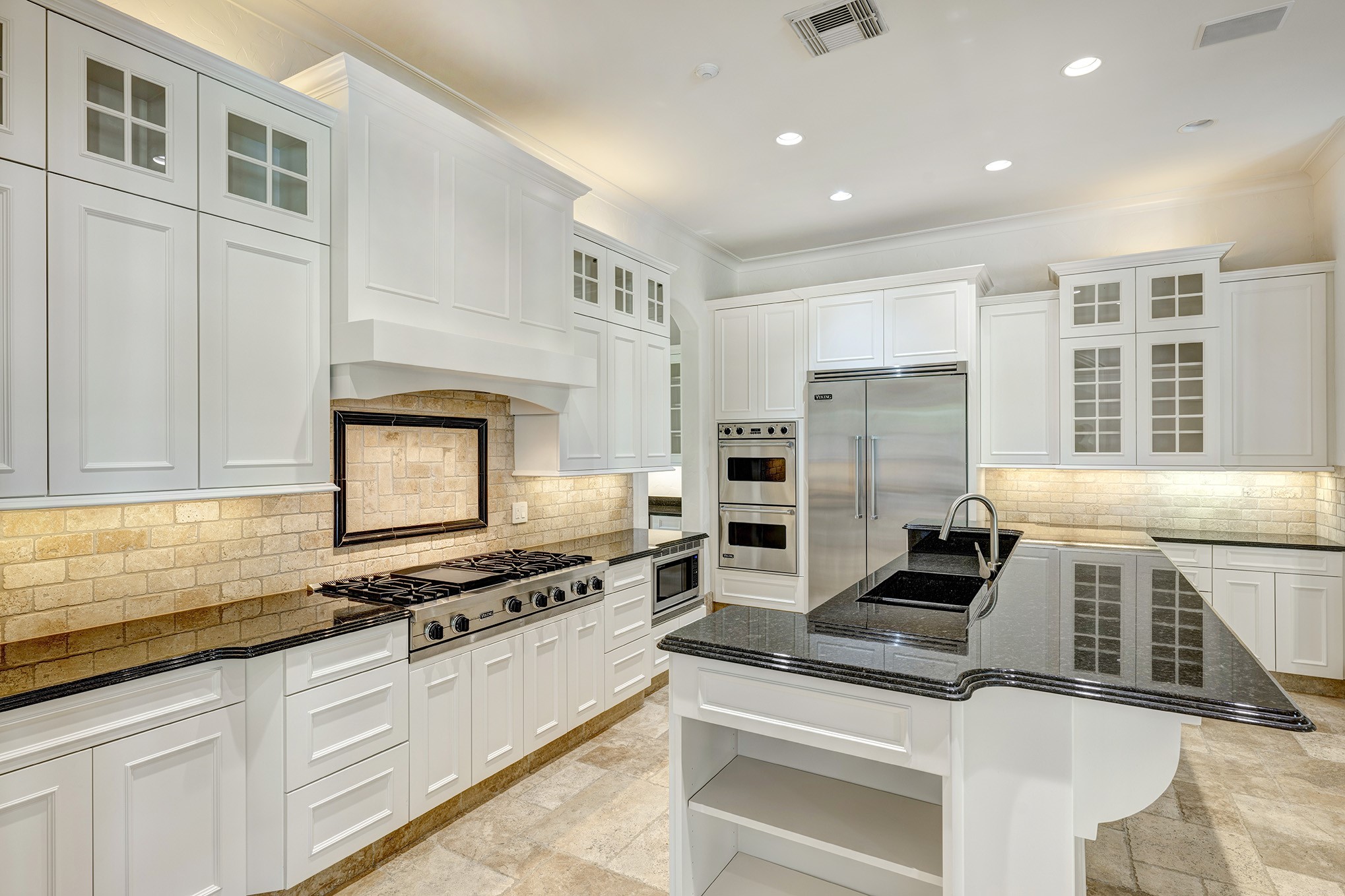 Kitchen features Viking stainless steel appliances.