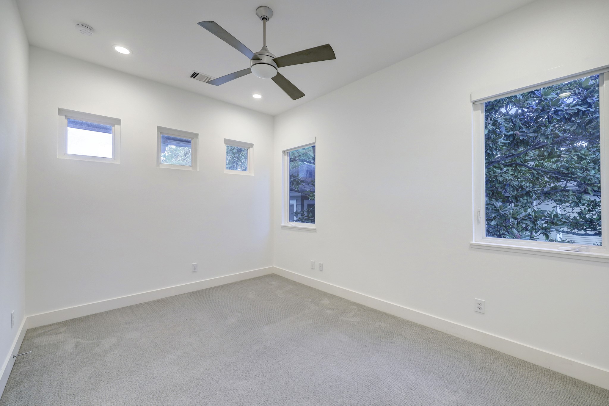 This spacious game room area is ready for endless fun and relaxation. Plenty of space for gaming, recreation, and quality time with family and friends.