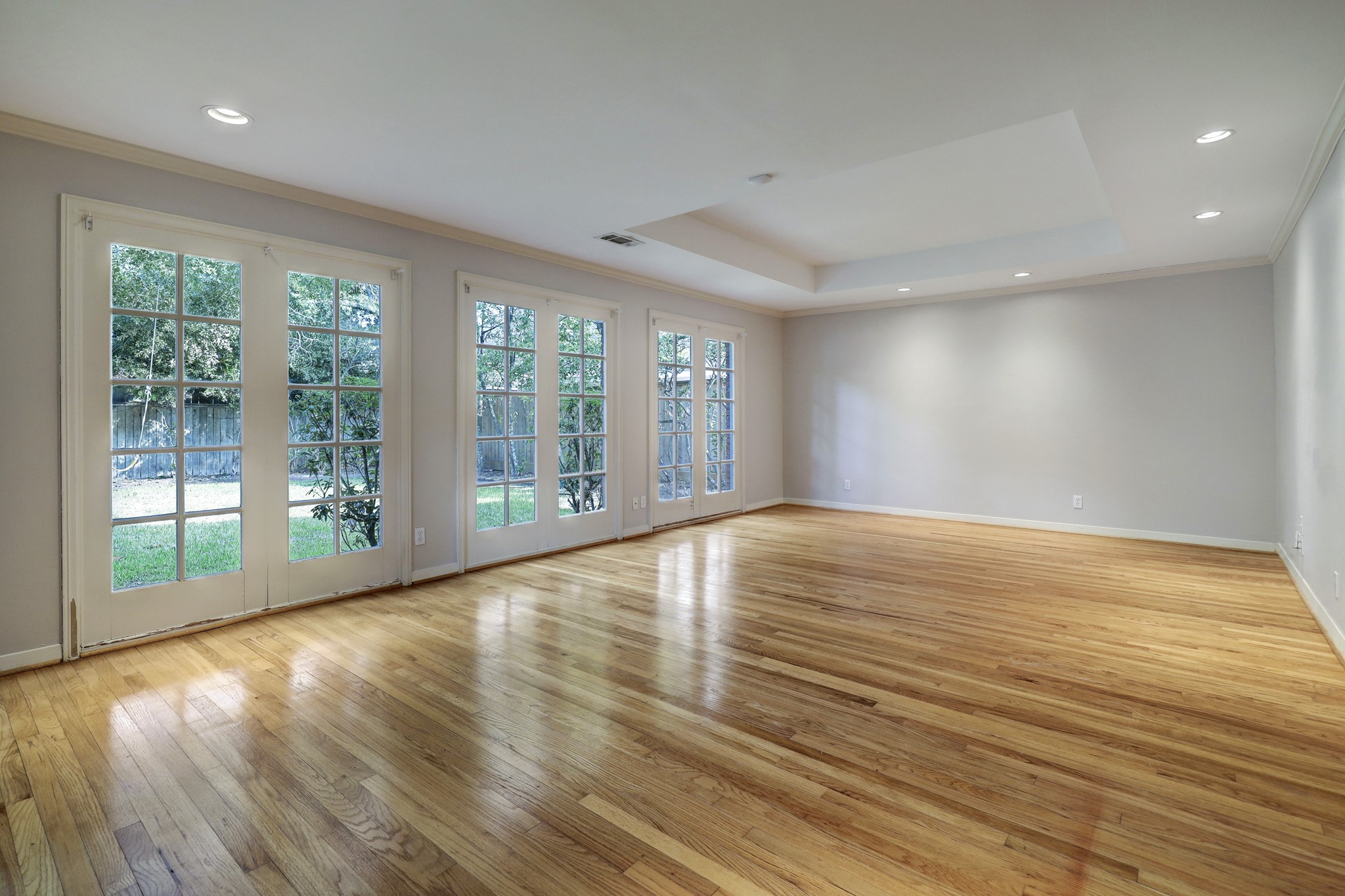 The light filled Primary bedroom overlooks the backyard.