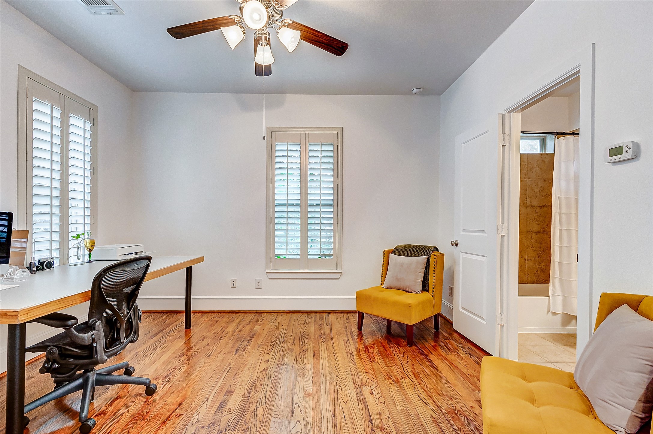 This room could be used as an office area, hobby room, or is perfect for a private guest room.