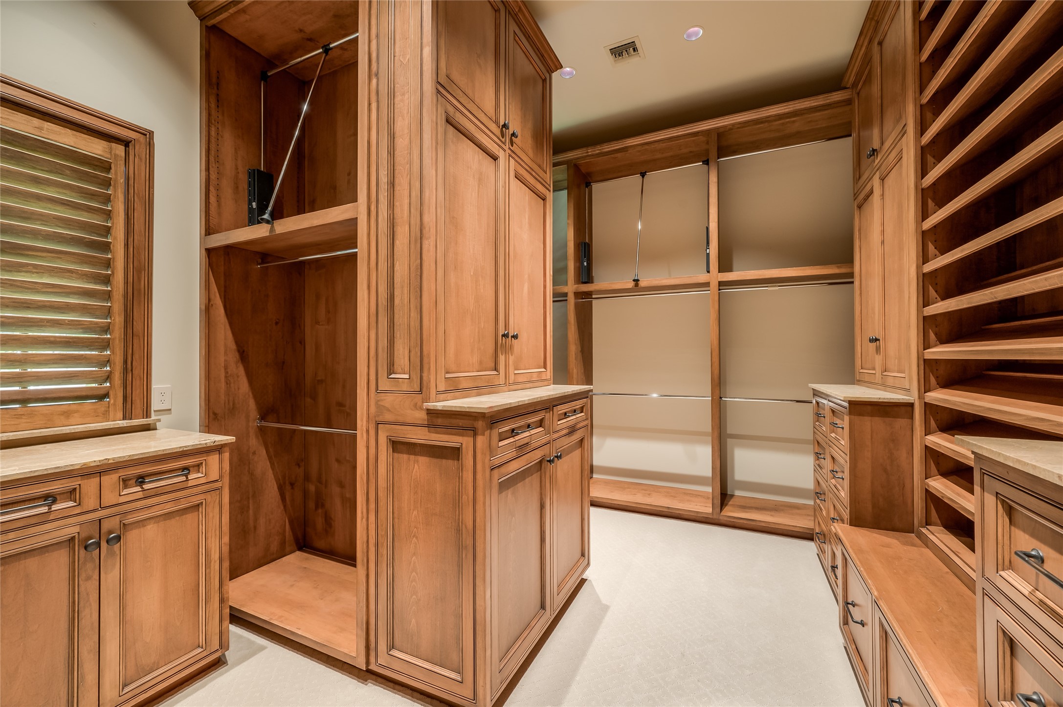 [One of Two Primary Baths]
The previously shown bedroom 's bath is the largest on the second floor. Note large walk-in closet at rear.