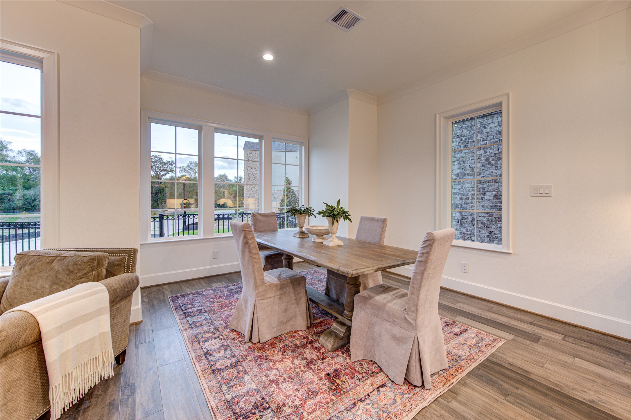 The formal dining room is conveniently located off the living room and kitchen in this modern open floorplan.