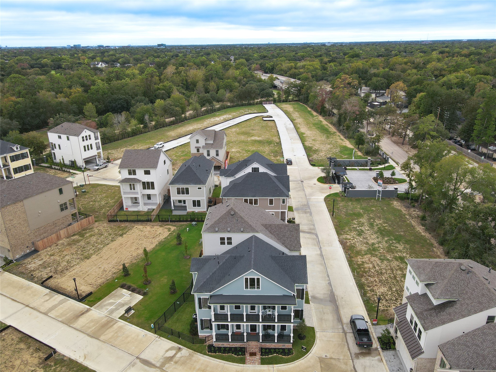So rare to find new construction in a gated community with direct access to Terry Hershey Park.