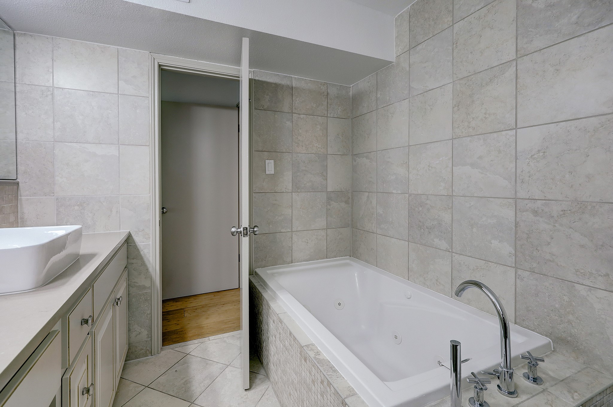 A jetted tub offers the perfect place to relax after a long day.
