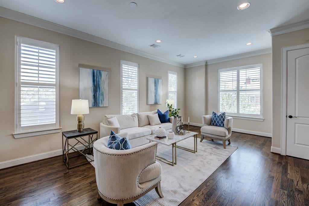  
Step into the formal living room, a space that breathes comfort and style. A beautiful balcony invites you to take a fresh breath, providing a seamless connection to the outside world while maintaining the intimacy of home.