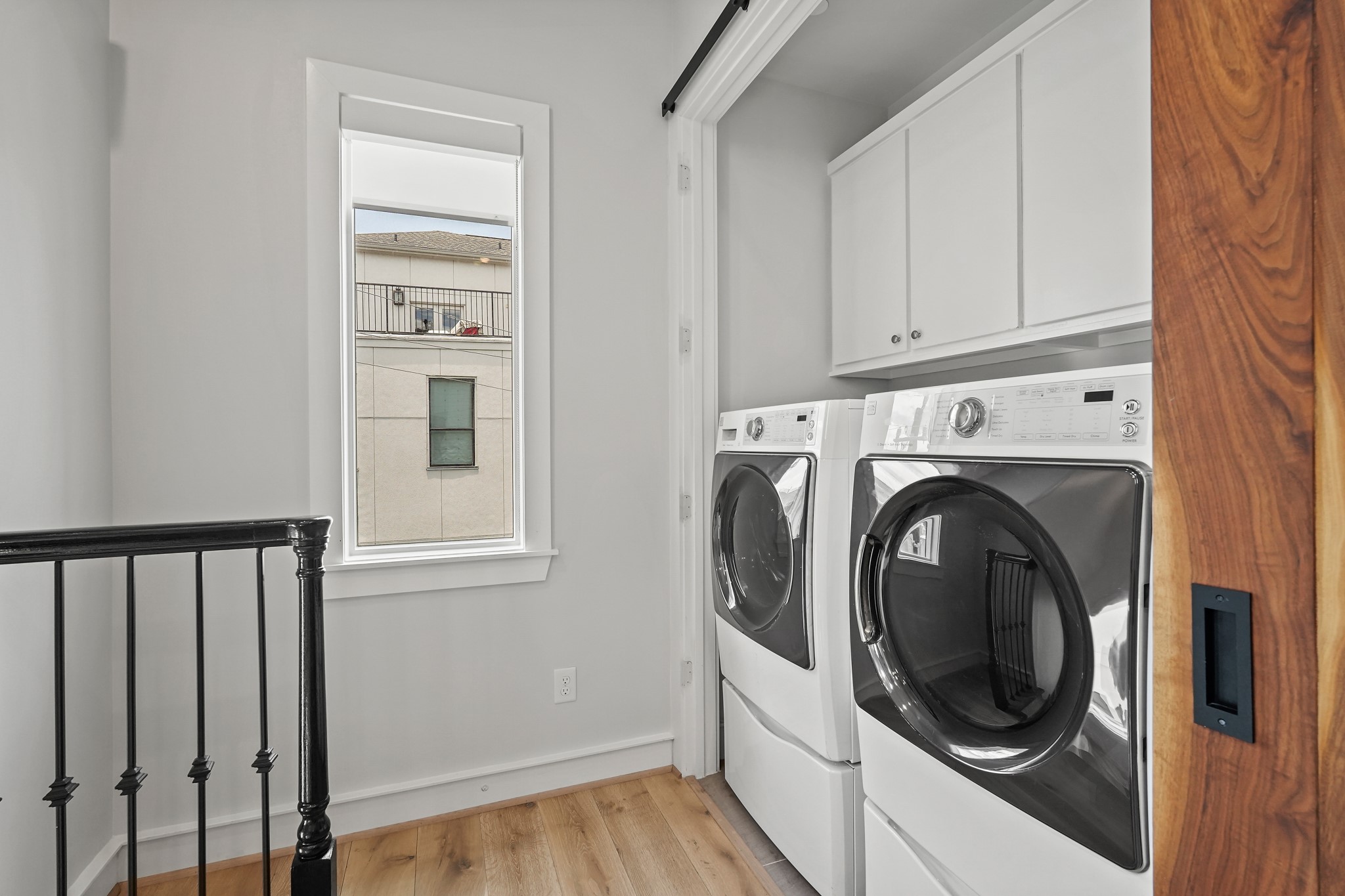 Built In Cabinets Above your Washer and Dryer Provide Extra Storage, w/ the Ability to Conceal Your Utility Room Behind a Warm, Solid Wood, Barn Door