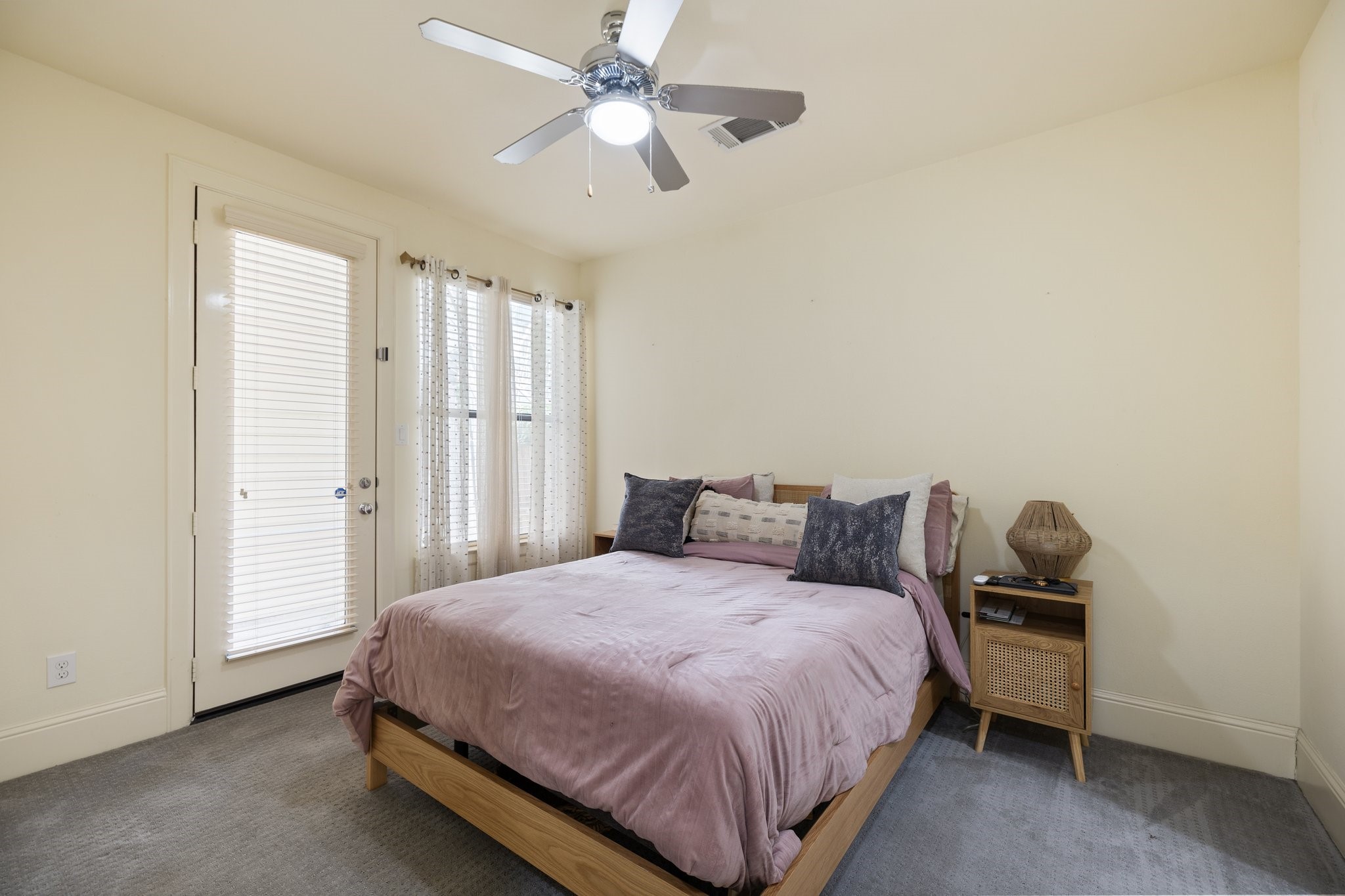 The first floor bedroom is spacious and features a great size closet.