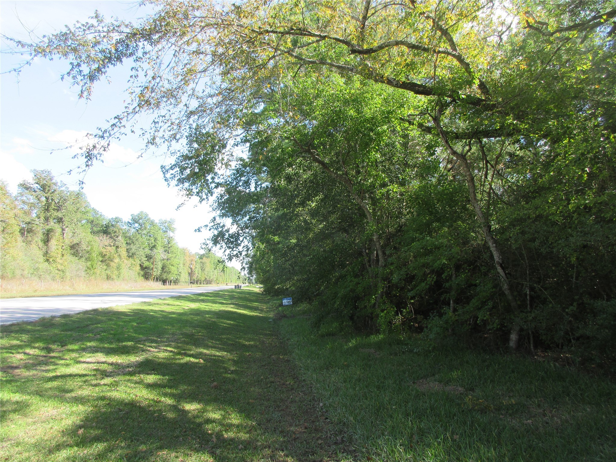 View down the road of the property line