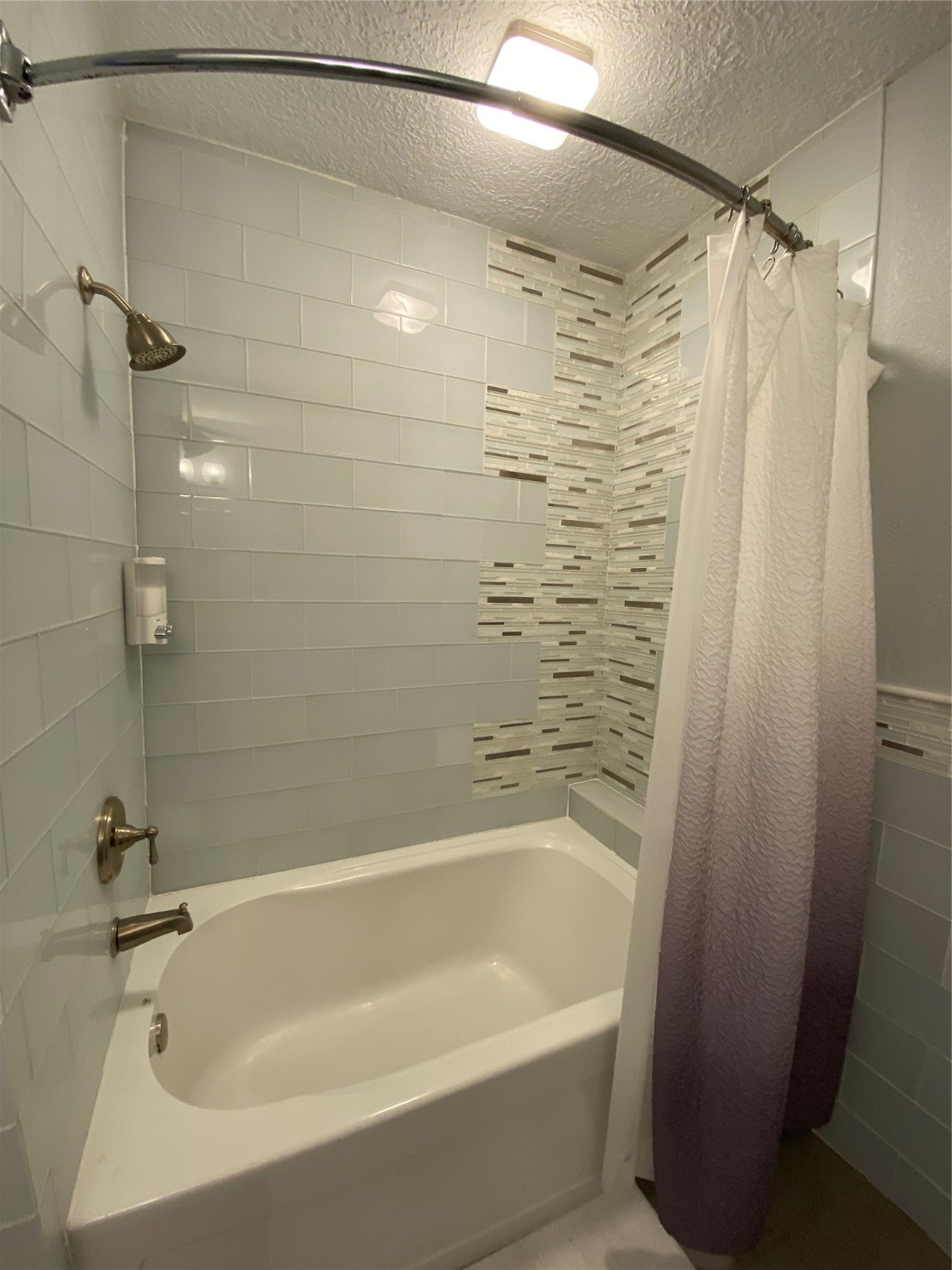 1635 Guest Bathroom with large soaker tub with shower combination