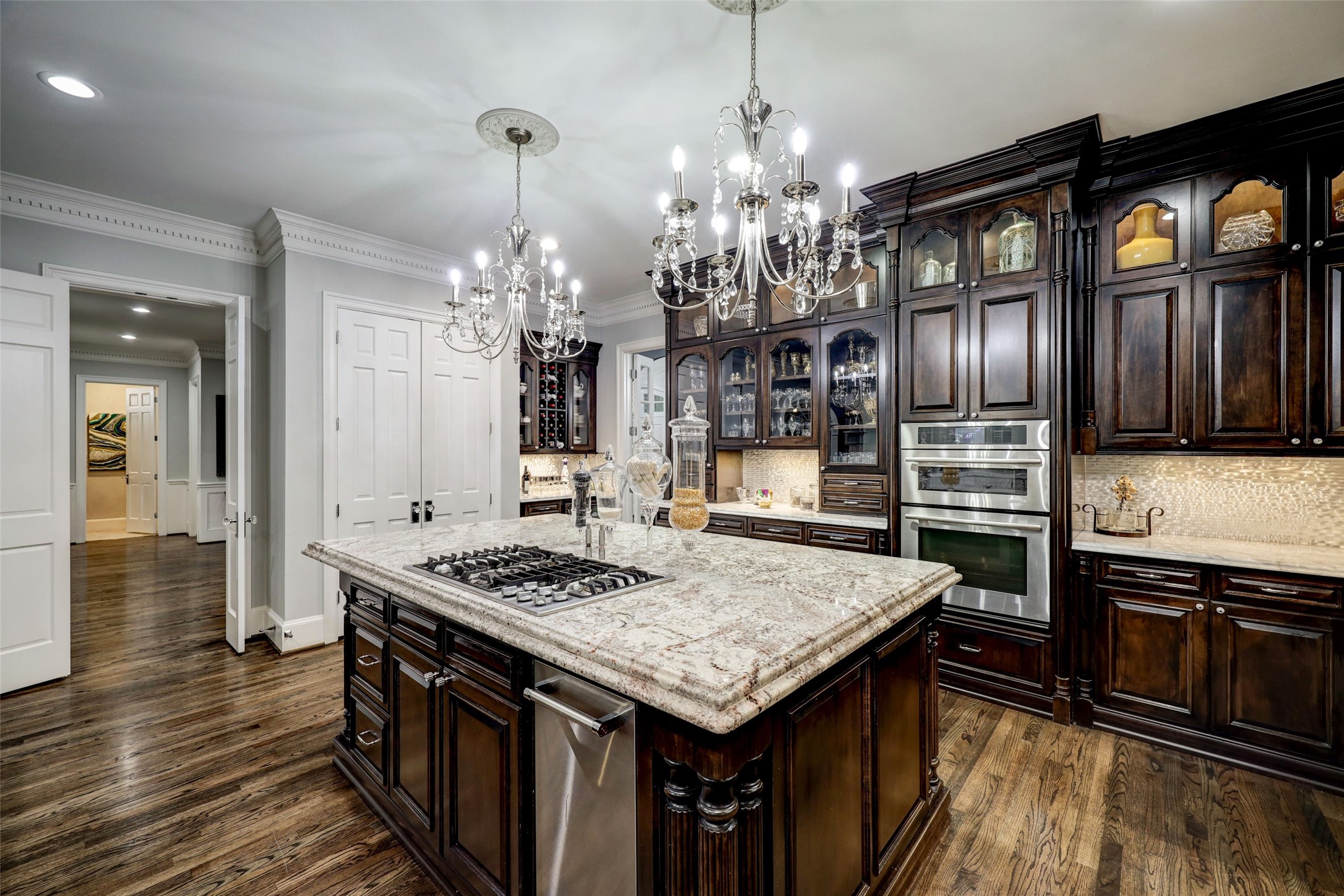 Elegant, timeless, and an inspired space to create inspired meals is the Kitchen. Within we have: a gas Range; Oven; Oven/Microwave combination; Butler's Pantry; a giant step-in Pantry; and miles and miles of countertops.