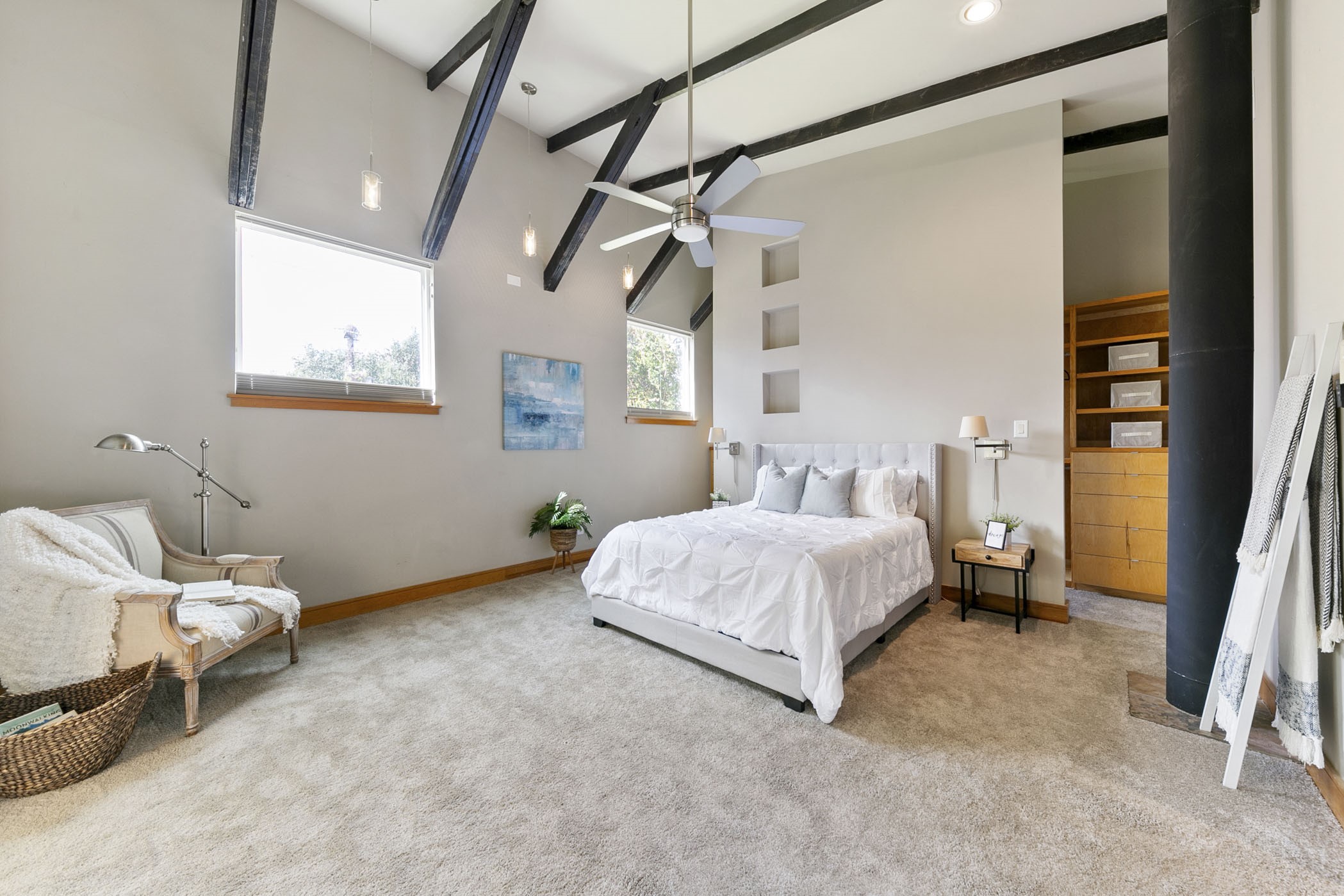 The tall ceilings and beams give this room a treehouse feel
