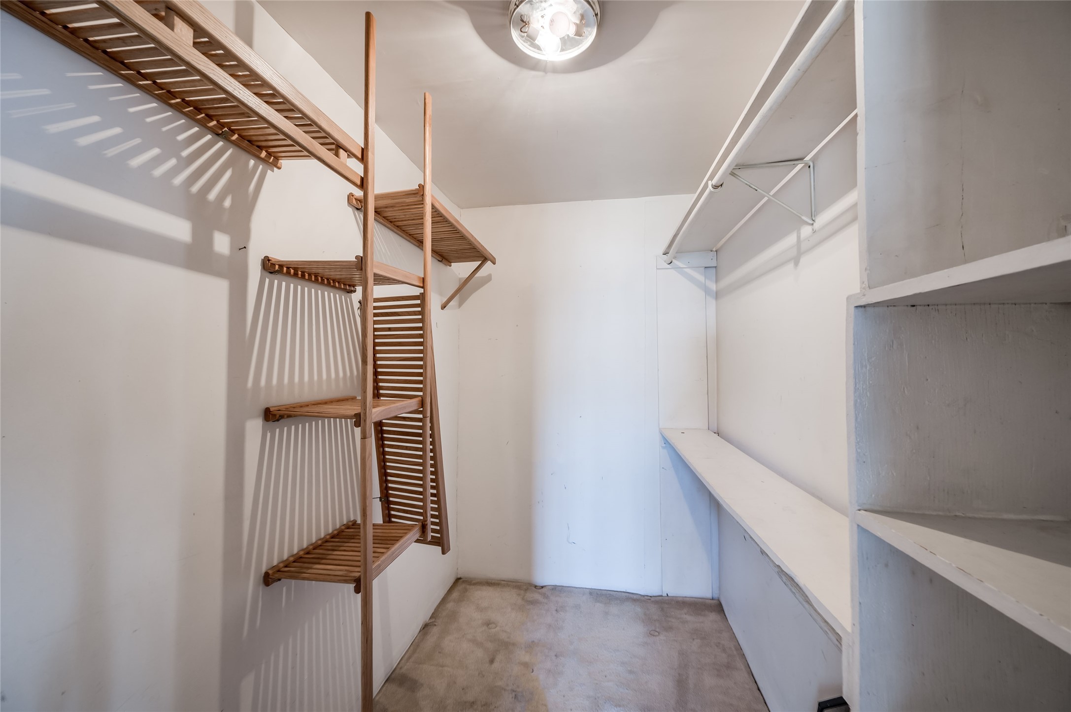 Loft sleeping quarters or storage space above garage apartment.