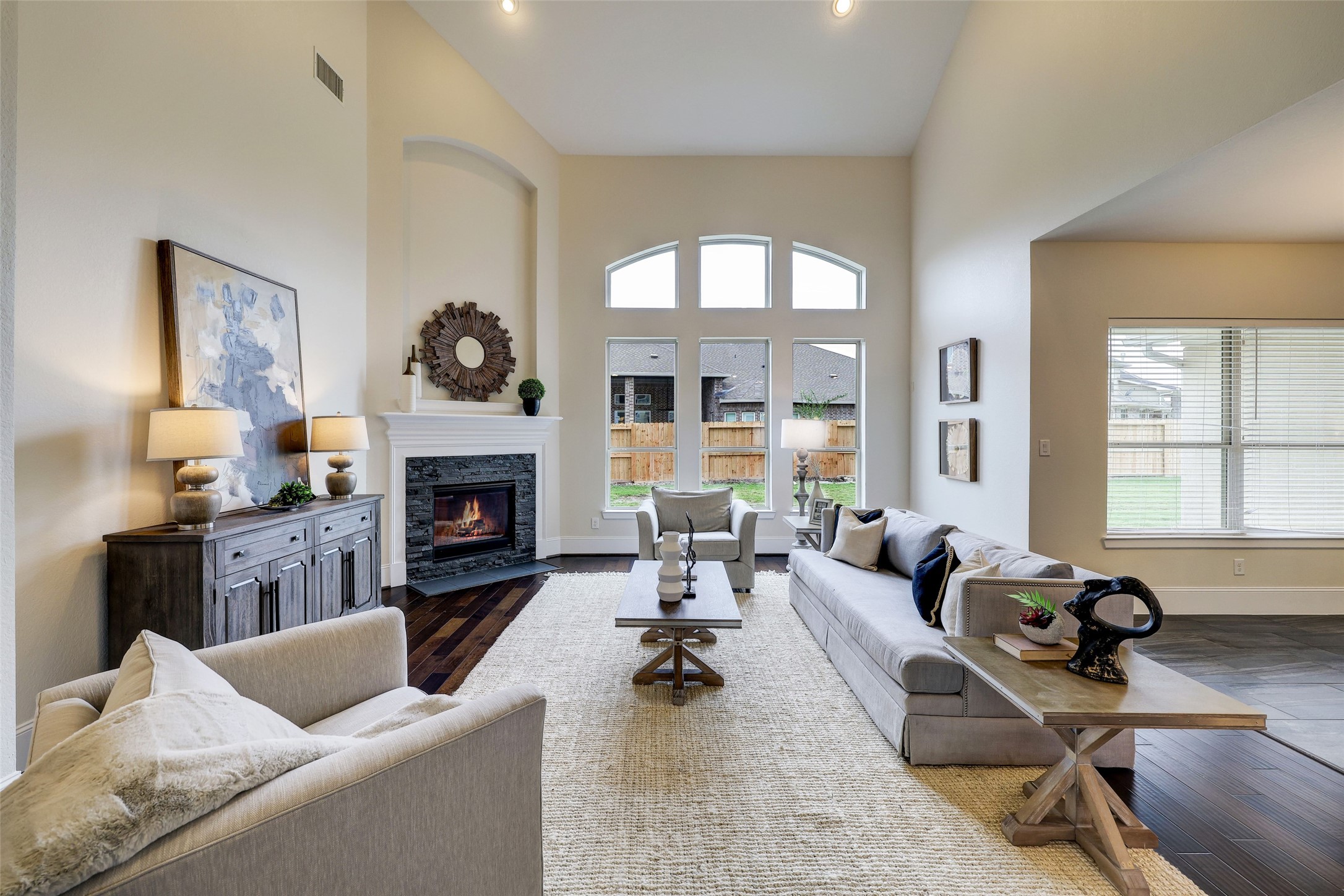 Balanced modern living for rest, play and relaxation is all right here, complete with built-ins and bright open sightlines to the backyard. The stylish fireplace provides warmth when the weather is cooler.
